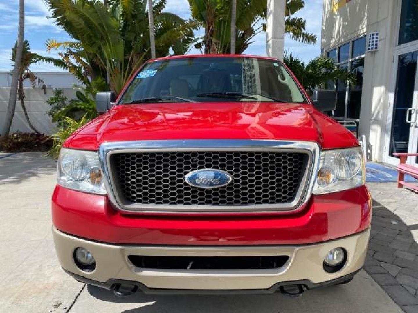 2007 Bright Red /Tan Ford F-150 Lariat 4WD LEATHER LOW MILES 80,286 (1FTPX14V97N) with an 5.4L 24-Valve EFI FFV V8 Engine engine, Automatic transmission, located at 4701 North Dixie Hwy, Pompano Beach, FL, 33064, (954) 422-2889, 26.240938, -80.123474 - OUR WEBPAGE FLORIDACARS1.COM HAS OVER 100 PHOTOS AND FREE CARFAX LINK 2007 Ford F-150 Lariat 4 Door Extended Cab Pickup 5.4L V8 F SOHC Flex Fuel 18 MPG Rear Wheel Drive w/ 4X4 Features 20 Inch Plus Wheels 4WD/AWD ABS Brakes Air Conditioning Alloy Wheels AM/FM Stereo Automatic Transmission Auxiliary- Photo#2
