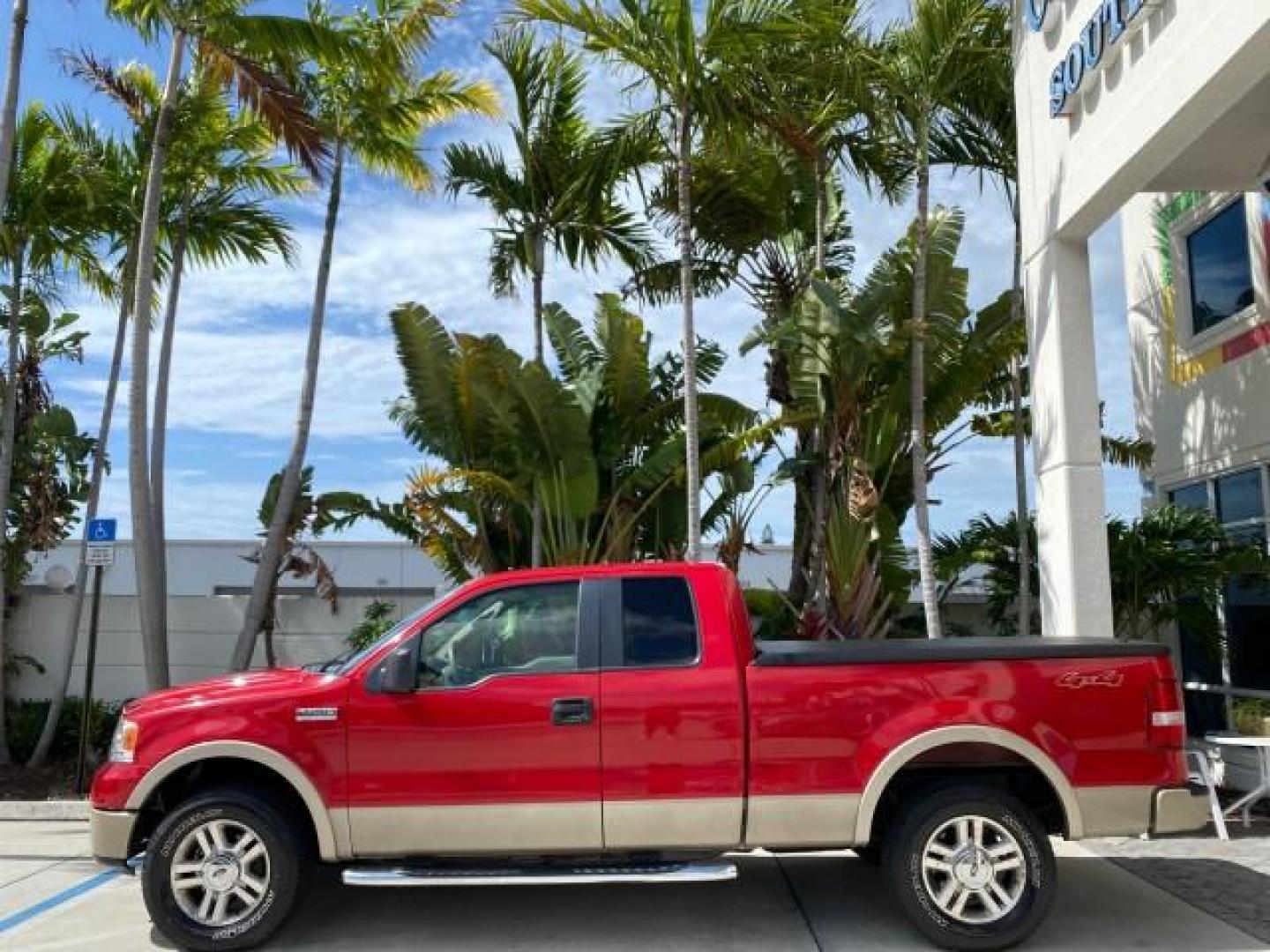 2007 Bright Red /Tan Ford F-150 Lariat 4WD LEATHER LOW MILES 80,286 (1FTPX14V97N) with an 5.4L 24-Valve EFI FFV V8 Engine engine, Automatic transmission, located at 4701 North Dixie Hwy, Pompano Beach, FL, 33064, (954) 422-2889, 26.240938, -80.123474 - OUR WEBPAGE FLORIDACARS1.COM HAS OVER 100 PHOTOS AND FREE CARFAX LINK 2007 Ford F-150 Lariat 4 Door Extended Cab Pickup 5.4L V8 F SOHC Flex Fuel 18 MPG Rear Wheel Drive w/ 4X4 Features 20 Inch Plus Wheels 4WD/AWD ABS Brakes Air Conditioning Alloy Wheels AM/FM Stereo Automatic Transmission Auxiliary- Photo#4