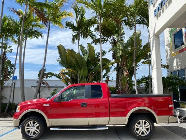 2007 Bright Red /Tan Ford F-150 Lariat 4WD LEATHER LOW MILES 80,286 (1FTPX14V97N) with an 5.4L 24-Valve EFI FFV V8 Engine engine, Automatic transmission, located at 4701 North Dixie Hwy, Pompano Beach, FL, 33064, (954) 422-2889, 26.240938, -80.123474 - OUR WEBPAGE FLORIDACARS1.COM HAS OVER 100 PHOTOS AND FREE CARFAX LINK 2007 Ford F-150 Lariat 4 Door Extended Cab Pickup 5.4L V8 F SOHC Flex Fuel 18 MPG Rear Wheel Drive w/ 4X4 Features 20 Inch Plus Wheels 4WD/AWD ABS Brakes Air Conditioning Alloy Wheels AM/FM Stereo Automatic Transmission Auxiliary - Photo#4