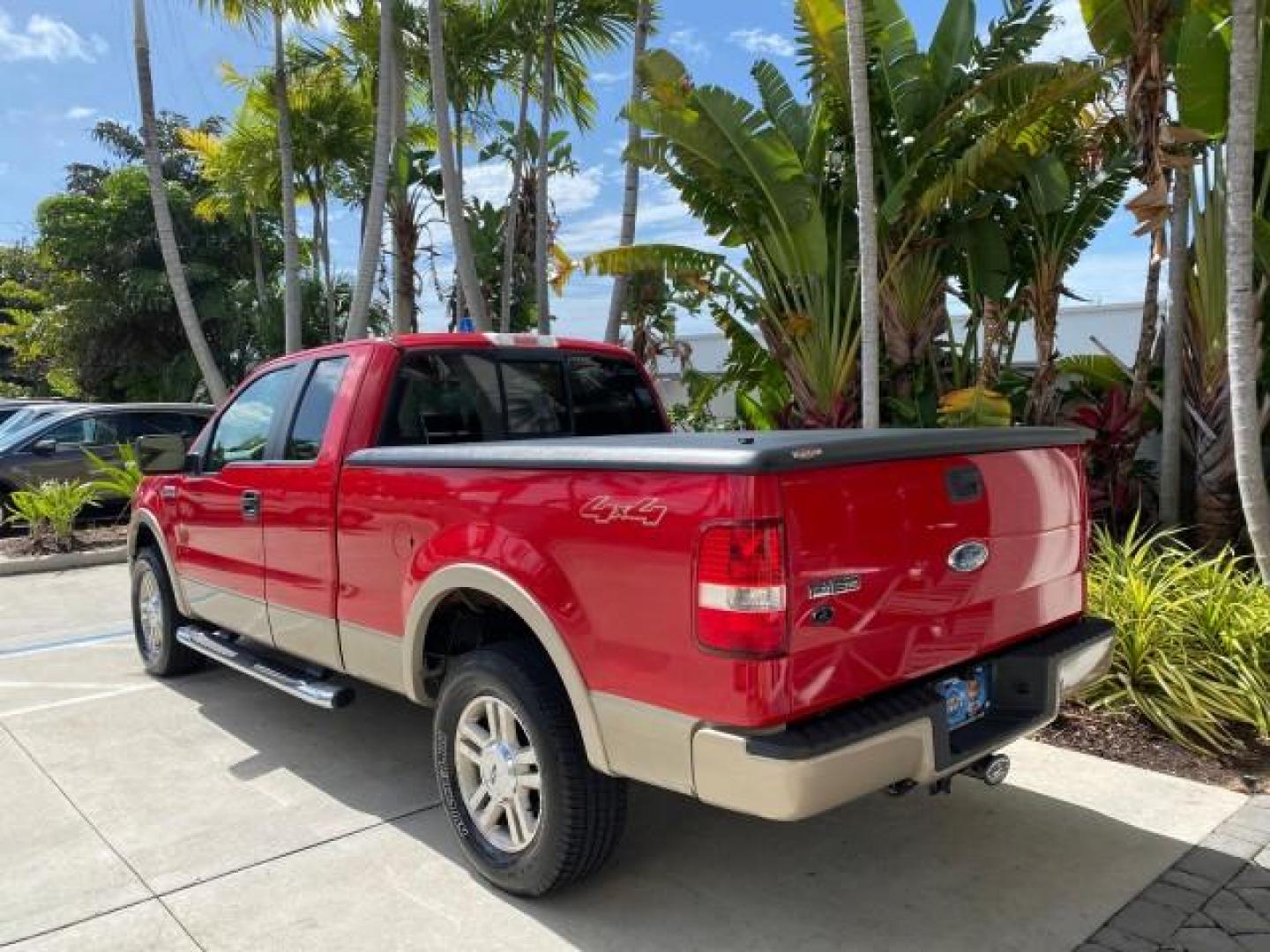 2007 Bright Red /Tan Ford F-150 Lariat 4WD LEATHER LOW MILES 80,286 (1FTPX14V97N) with an 5.4L 24-Valve EFI FFV V8 Engine engine, Automatic transmission, located at 4701 North Dixie Hwy, Pompano Beach, FL, 33064, (954) 422-2889, 26.240938, -80.123474 - OUR WEBPAGE FLORIDACARS1.COM HAS OVER 100 PHOTOS AND FREE CARFAX LINK 2007 Ford F-150 Lariat 4 Door Extended Cab Pickup 5.4L V8 F SOHC Flex Fuel 18 MPG Rear Wheel Drive w/ 4X4 Features 20 Inch Plus Wheels 4WD/AWD ABS Brakes Air Conditioning Alloy Wheels AM/FM Stereo Automatic Transmission Auxiliary- Photo#5
