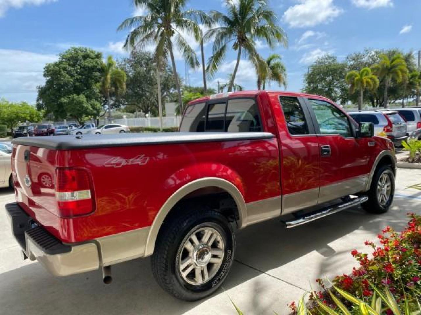 2007 Bright Red /Tan Ford F-150 Lariat 4WD LEATHER LOW MILES 80,286 (1FTPX14V97N) with an 5.4L 24-Valve EFI FFV V8 Engine engine, Automatic transmission, located at 4701 North Dixie Hwy, Pompano Beach, FL, 33064, (954) 422-2889, 26.240938, -80.123474 - OUR WEBPAGE FLORIDACARS1.COM HAS OVER 100 PHOTOS AND FREE CARFAX LINK 2007 Ford F-150 Lariat 4 Door Extended Cab Pickup 5.4L V8 F SOHC Flex Fuel 18 MPG Rear Wheel Drive w/ 4X4 Features 20 Inch Plus Wheels 4WD/AWD ABS Brakes Air Conditioning Alloy Wheels AM/FM Stereo Automatic Transmission Auxiliary- Photo#7
