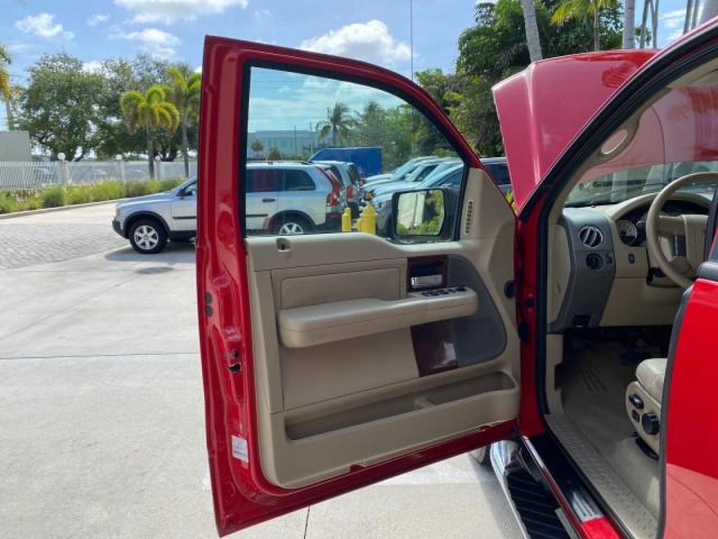 2007 Bright Red /Tan Ford F-150 Lariat 4WD LEATHER LOW MILES 80,286 (1FTPX14V97N) with an 5.4L 24-Valve EFI FFV V8 Engine engine, Automatic transmission, located at 4701 North Dixie Hwy, Pompano Beach, FL, 33064, (954) 422-2889, 26.240938, -80.123474 - OUR WEBPAGE FLORIDACARS1.COM HAS OVER 100 PHOTOS AND FREE CARFAX LINK 2007 Ford F-150 Lariat 4 Door Extended Cab Pickup 5.4L V8 F SOHC Flex Fuel 18 MPG Rear Wheel Drive w/ 4X4 Features 20 Inch Plus Wheels 4WD/AWD ABS Brakes Air Conditioning Alloy Wheels AM/FM Stereo Automatic Transmission Auxiliary- Photo#9