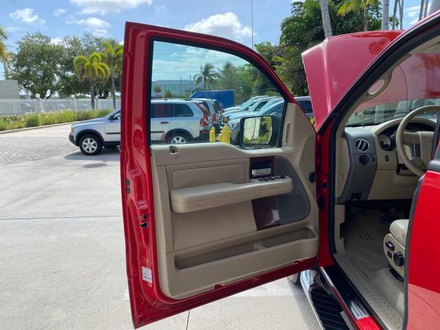 2007 Bright Red /Tan Ford F-150 Lariat 4WD LEATHER LOW MILES 80,286 (1FTPX14V97N) with an 5.4L 24-Valve EFI FFV V8 Engine engine, Automatic transmission, located at 4701 North Dixie Hwy, Pompano Beach, FL, 33064, (954) 422-2889, 26.240938, -80.123474 - OUR WEBPAGE FLORIDACARS1.COM HAS OVER 100 PHOTOS AND FREE CARFAX LINK 2007 Ford F-150 Lariat 4 Door Extended Cab Pickup 5.4L V8 F SOHC Flex Fuel 18 MPG Rear Wheel Drive w/ 4X4 Features 20 Inch Plus Wheels 4WD/AWD ABS Brakes Air Conditioning Alloy Wheels AM/FM Stereo Automatic Transmission Auxiliary - Photo#9