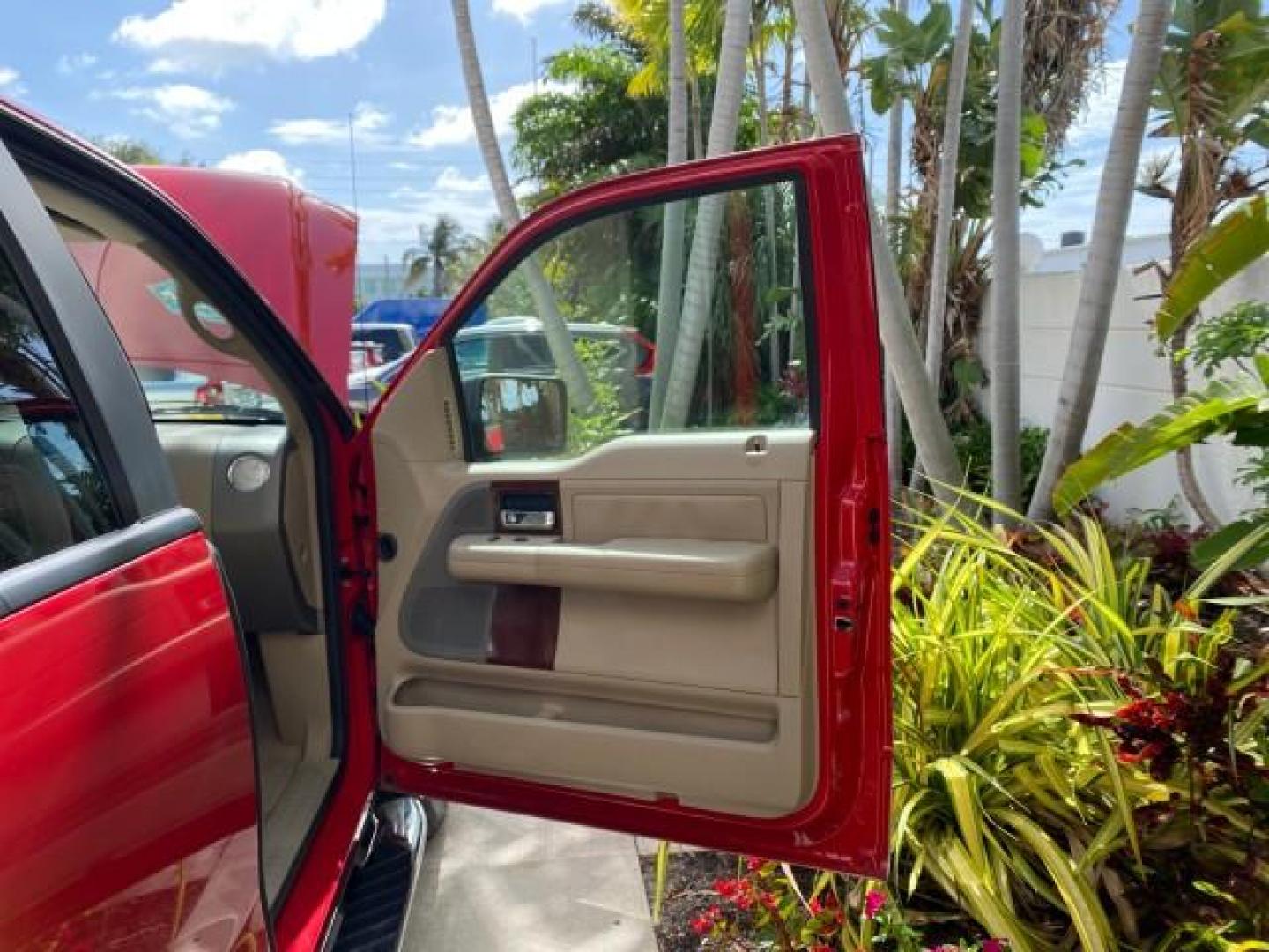 2007 Bright Red /Tan Ford F-150 Lariat 4WD LEATHER LOW MILES 80,286 (1FTPX14V97N) with an 5.4L 24-Valve EFI FFV V8 Engine engine, Automatic transmission, located at 4701 North Dixie Hwy, Pompano Beach, FL, 33064, (954) 422-2889, 26.240938, -80.123474 - OUR WEBPAGE FLORIDACARS1.COM HAS OVER 100 PHOTOS AND FREE CARFAX LINK 2007 Ford F-150 Lariat 4 Door Extended Cab Pickup 5.4L V8 F SOHC Flex Fuel 18 MPG Rear Wheel Drive w/ 4X4 Features 20 Inch Plus Wheels 4WD/AWD ABS Brakes Air Conditioning Alloy Wheels AM/FM Stereo Automatic Transmission Auxiliary- Photo#11