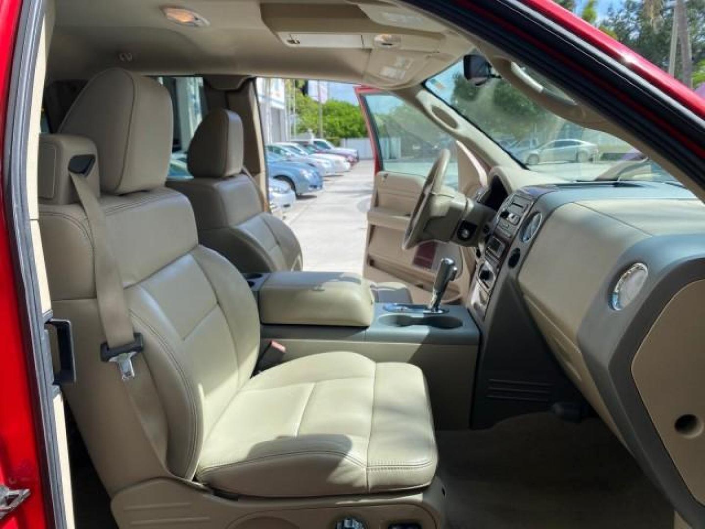 2007 Bright Red /Tan Ford F-150 Lariat 4WD LEATHER LOW MILES 80,286 (1FTPX14V97N) with an 5.4L 24-Valve EFI FFV V8 Engine engine, Automatic transmission, located at 4701 North Dixie Hwy, Pompano Beach, FL, 33064, (954) 422-2889, 26.240938, -80.123474 - OUR WEBPAGE FLORIDACARS1.COM HAS OVER 100 PHOTOS AND FREE CARFAX LINK 2007 Ford F-150 Lariat 4 Door Extended Cab Pickup 5.4L V8 F SOHC Flex Fuel 18 MPG Rear Wheel Drive w/ 4X4 Features 20 Inch Plus Wheels 4WD/AWD ABS Brakes Air Conditioning Alloy Wheels AM/FM Stereo Automatic Transmission Auxiliary- Photo#12