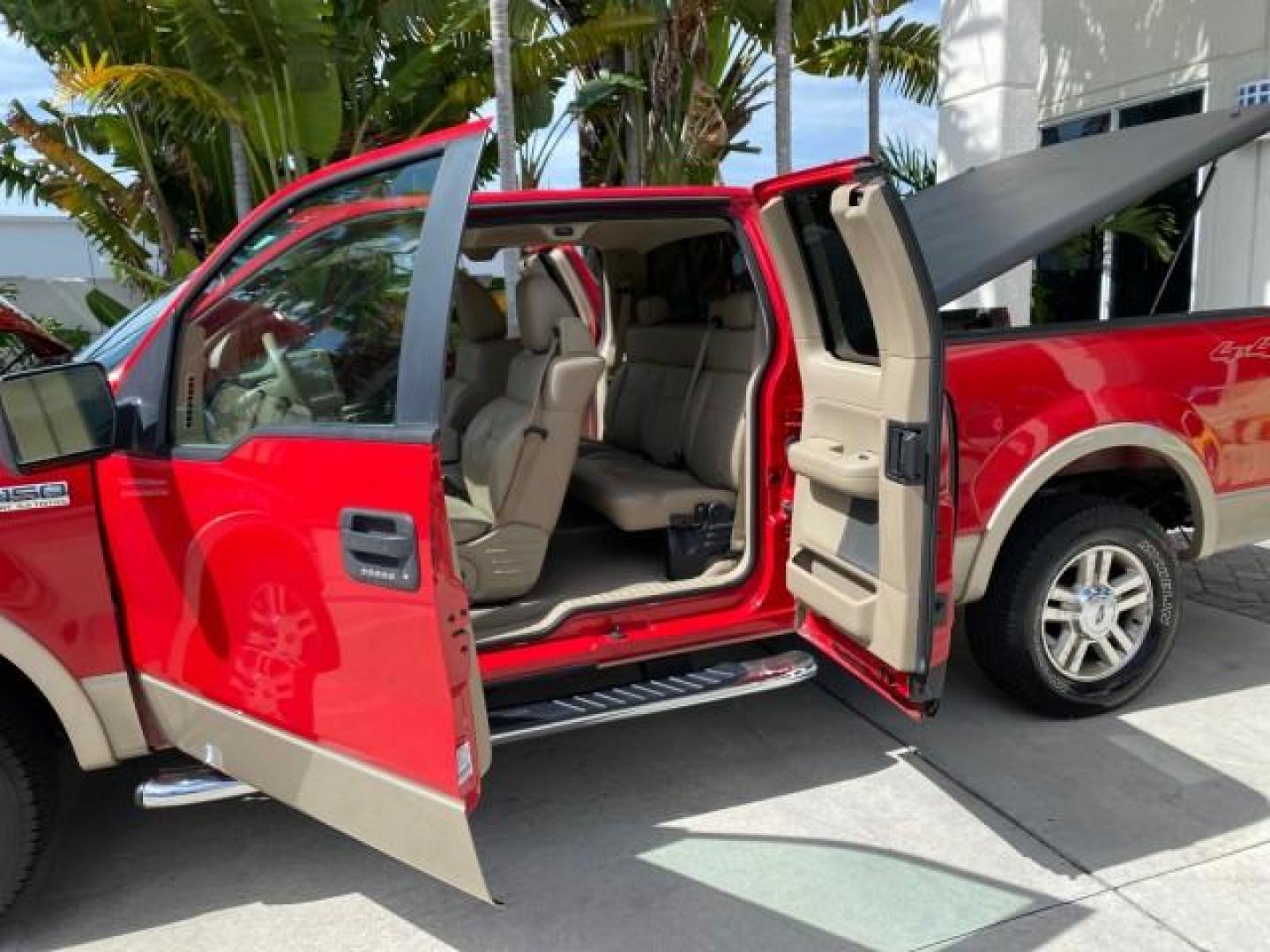 2007 Bright Red /Tan Ford F-150 Lariat 4WD LEATHER LOW MILES 80,286 (1FTPX14V97N) with an 5.4L 24-Valve EFI FFV V8 Engine engine, Automatic transmission, located at 4701 North Dixie Hwy, Pompano Beach, FL, 33064, (954) 422-2889, 26.240938, -80.123474 - OUR WEBPAGE FLORIDACARS1.COM HAS OVER 100 PHOTOS AND FREE CARFAX LINK 2007 Ford F-150 Lariat 4 Door Extended Cab Pickup 5.4L V8 F SOHC Flex Fuel 18 MPG Rear Wheel Drive w/ 4X4 Features 20 Inch Plus Wheels 4WD/AWD ABS Brakes Air Conditioning Alloy Wheels AM/FM Stereo Automatic Transmission Auxiliary- Photo#13
