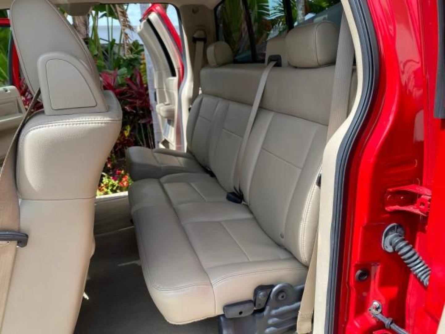 2007 Bright Red /Tan Ford F-150 Lariat 4WD LEATHER LOW MILES 80,286 (1FTPX14V97N) with an 5.4L 24-Valve EFI FFV V8 Engine engine, Automatic transmission, located at 4701 North Dixie Hwy, Pompano Beach, FL, 33064, (954) 422-2889, 26.240938, -80.123474 - OUR WEBPAGE FLORIDACARS1.COM HAS OVER 100 PHOTOS AND FREE CARFAX LINK 2007 Ford F-150 Lariat 4 Door Extended Cab Pickup 5.4L V8 F SOHC Flex Fuel 18 MPG Rear Wheel Drive w/ 4X4 Features 20 Inch Plus Wheels 4WD/AWD ABS Brakes Air Conditioning Alloy Wheels AM/FM Stereo Automatic Transmission Auxiliary- Photo#14