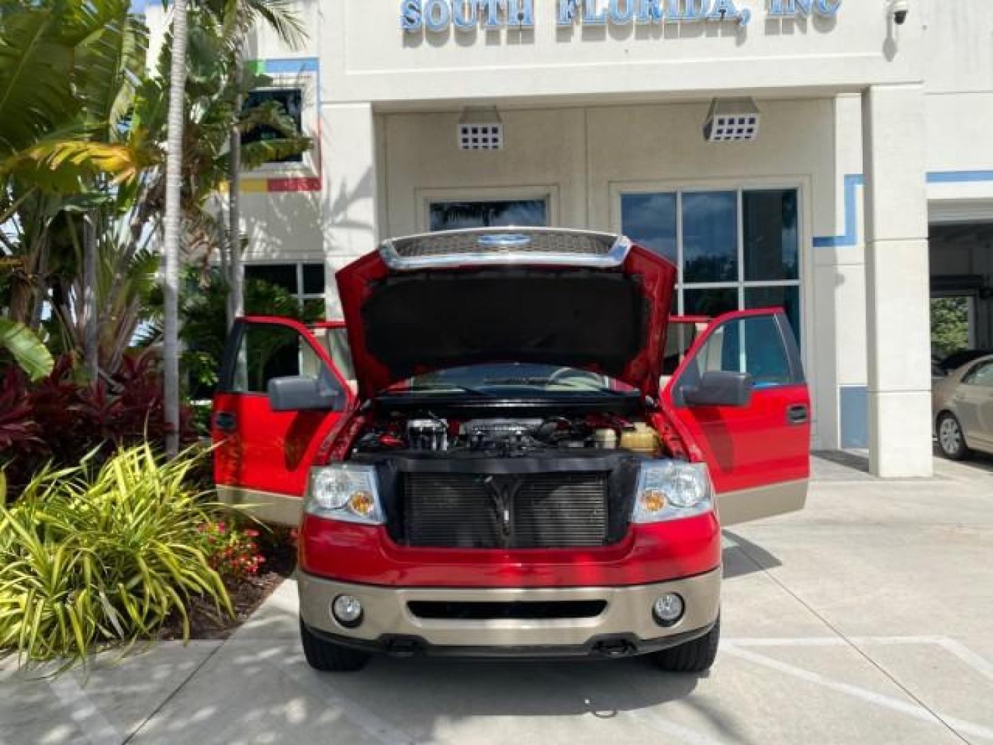 2007 Bright Red /Tan Ford F-150 Lariat 4WD LEATHER LOW MILES 80,286 (1FTPX14V97N) with an 5.4L 24-Valve EFI FFV V8 Engine engine, Automatic transmission, located at 4701 North Dixie Hwy, Pompano Beach, FL, 33064, (954) 422-2889, 26.240938, -80.123474 - OUR WEBPAGE FLORIDACARS1.COM HAS OVER 100 PHOTOS AND FREE CARFAX LINK 2007 Ford F-150 Lariat 4 Door Extended Cab Pickup 5.4L V8 F SOHC Flex Fuel 18 MPG Rear Wheel Drive w/ 4X4 Features 20 Inch Plus Wheels 4WD/AWD ABS Brakes Air Conditioning Alloy Wheels AM/FM Stereo Automatic Transmission Auxiliary- Photo#16