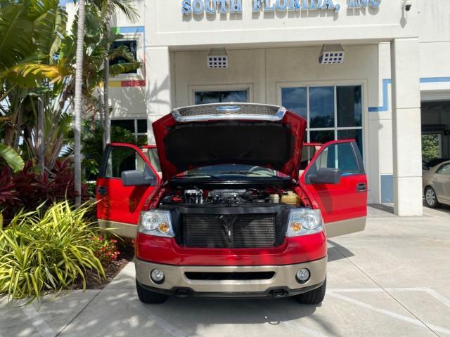2007 Bright Red /Tan Ford F-150 Lariat 4WD LEATHER LOW MILES 80,286 (1FTPX14V97N) with an 5.4L 24-Valve EFI FFV V8 Engine engine, Automatic transmission, located at 4701 North Dixie Hwy, Pompano Beach, FL, 33064, (954) 422-2889, 26.240938, -80.123474 - OUR WEBPAGE FLORIDACARS1.COM HAS OVER 100 PHOTOS AND FREE CARFAX LINK 2007 Ford F-150 Lariat 4 Door Extended Cab Pickup 5.4L V8 F SOHC Flex Fuel 18 MPG Rear Wheel Drive w/ 4X4 Features 20 Inch Plus Wheels 4WD/AWD ABS Brakes Air Conditioning Alloy Wheels AM/FM Stereo Automatic Transmission Auxiliary - Photo#16