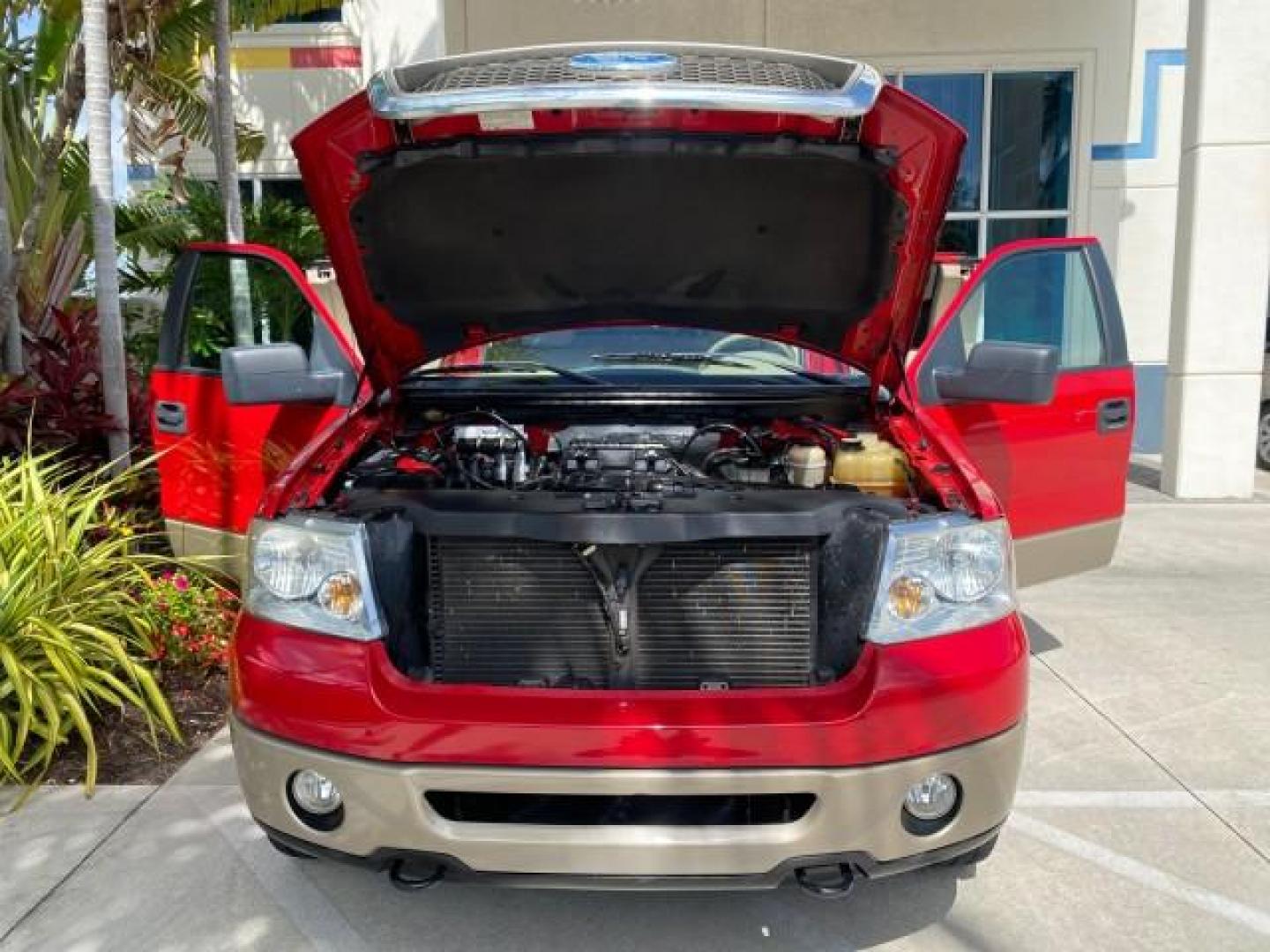 2007 Bright Red /Tan Ford F-150 Lariat 4WD LEATHER LOW MILES 80,286 (1FTPX14V97N) with an 5.4L 24-Valve EFI FFV V8 Engine engine, Automatic transmission, located at 4701 North Dixie Hwy, Pompano Beach, FL, 33064, (954) 422-2889, 26.240938, -80.123474 - OUR WEBPAGE FLORIDACARS1.COM HAS OVER 100 PHOTOS AND FREE CARFAX LINK 2007 Ford F-150 Lariat 4 Door Extended Cab Pickup 5.4L V8 F SOHC Flex Fuel 18 MPG Rear Wheel Drive w/ 4X4 Features 20 Inch Plus Wheels 4WD/AWD ABS Brakes Air Conditioning Alloy Wheels AM/FM Stereo Automatic Transmission Auxiliary- Photo#17