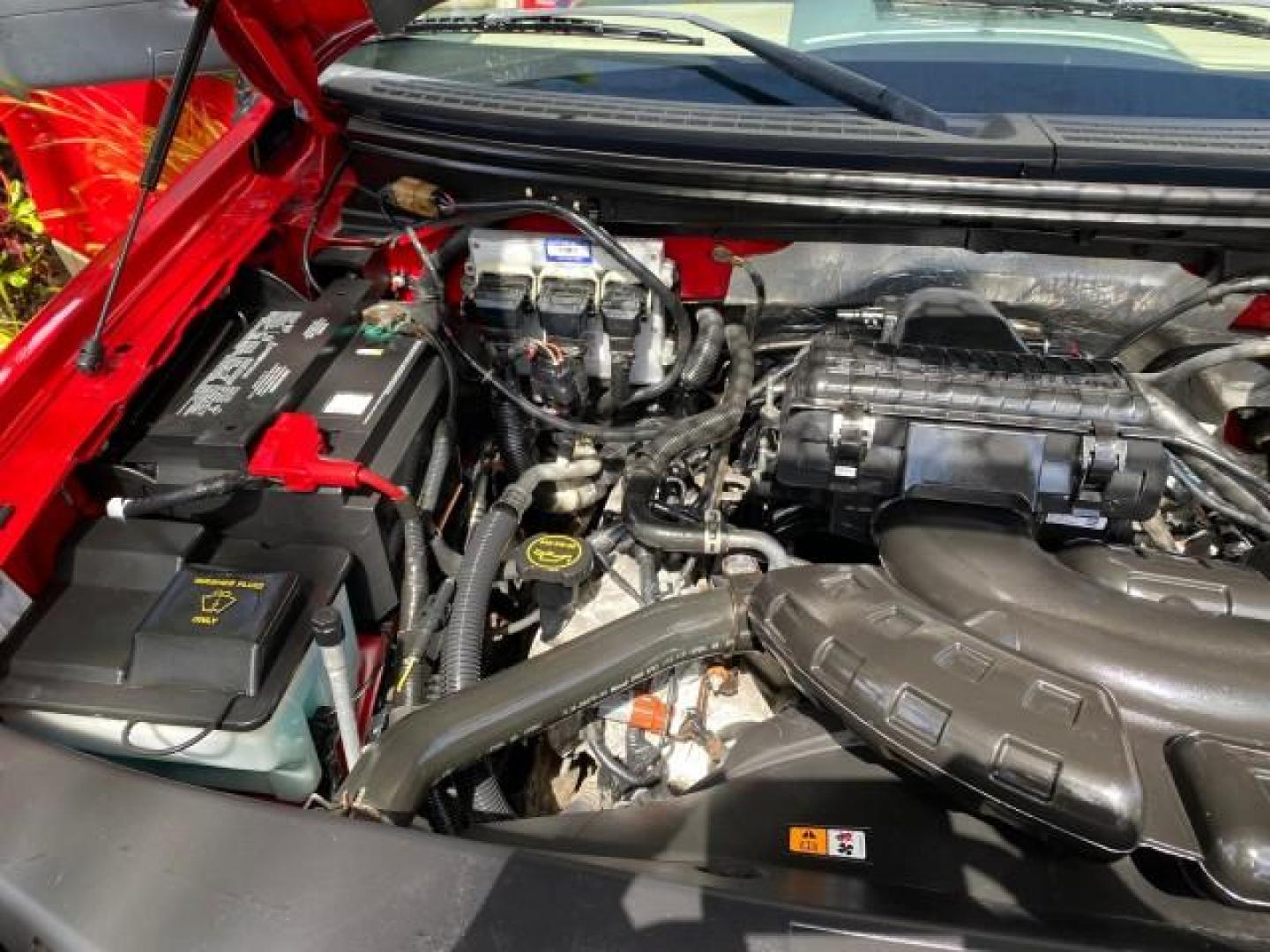 2007 Bright Red /Tan Ford F-150 Lariat 4WD LEATHER LOW MILES 80,286 (1FTPX14V97N) with an 5.4L 24-Valve EFI FFV V8 Engine engine, Automatic transmission, located at 4701 North Dixie Hwy, Pompano Beach, FL, 33064, (954) 422-2889, 26.240938, -80.123474 - OUR WEBPAGE FLORIDACARS1.COM HAS OVER 100 PHOTOS AND FREE CARFAX LINK 2007 Ford F-150 Lariat 4 Door Extended Cab Pickup 5.4L V8 F SOHC Flex Fuel 18 MPG Rear Wheel Drive w/ 4X4 Features 20 Inch Plus Wheels 4WD/AWD ABS Brakes Air Conditioning Alloy Wheels AM/FM Stereo Automatic Transmission Auxiliary- Photo#24