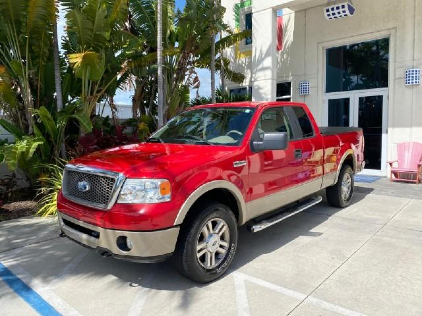 2007 Bright Red /Tan Ford F-150 Lariat 4WD LEATHER LOW MILES 80,286 (1FTPX14V97N) with an 5.4L 24-Valve EFI FFV V8 Engine engine, Automatic transmission, located at 4701 North Dixie Hwy, Pompano Beach, FL, 33064, (954) 422-2889, 26.240938, -80.123474 - OUR WEBPAGE FLORIDACARS1.COM HAS OVER 100 PHOTOS AND FREE CARFAX LINK 2007 Ford F-150 Lariat 4 Door Extended Cab Pickup 5.4L V8 F SOHC Flex Fuel 18 MPG Rear Wheel Drive w/ 4X4 Features 20 Inch Plus Wheels 4WD/AWD ABS Brakes Air Conditioning Alloy Wheels AM/FM Stereo Automatic Transmission Auxiliary- Photo#29