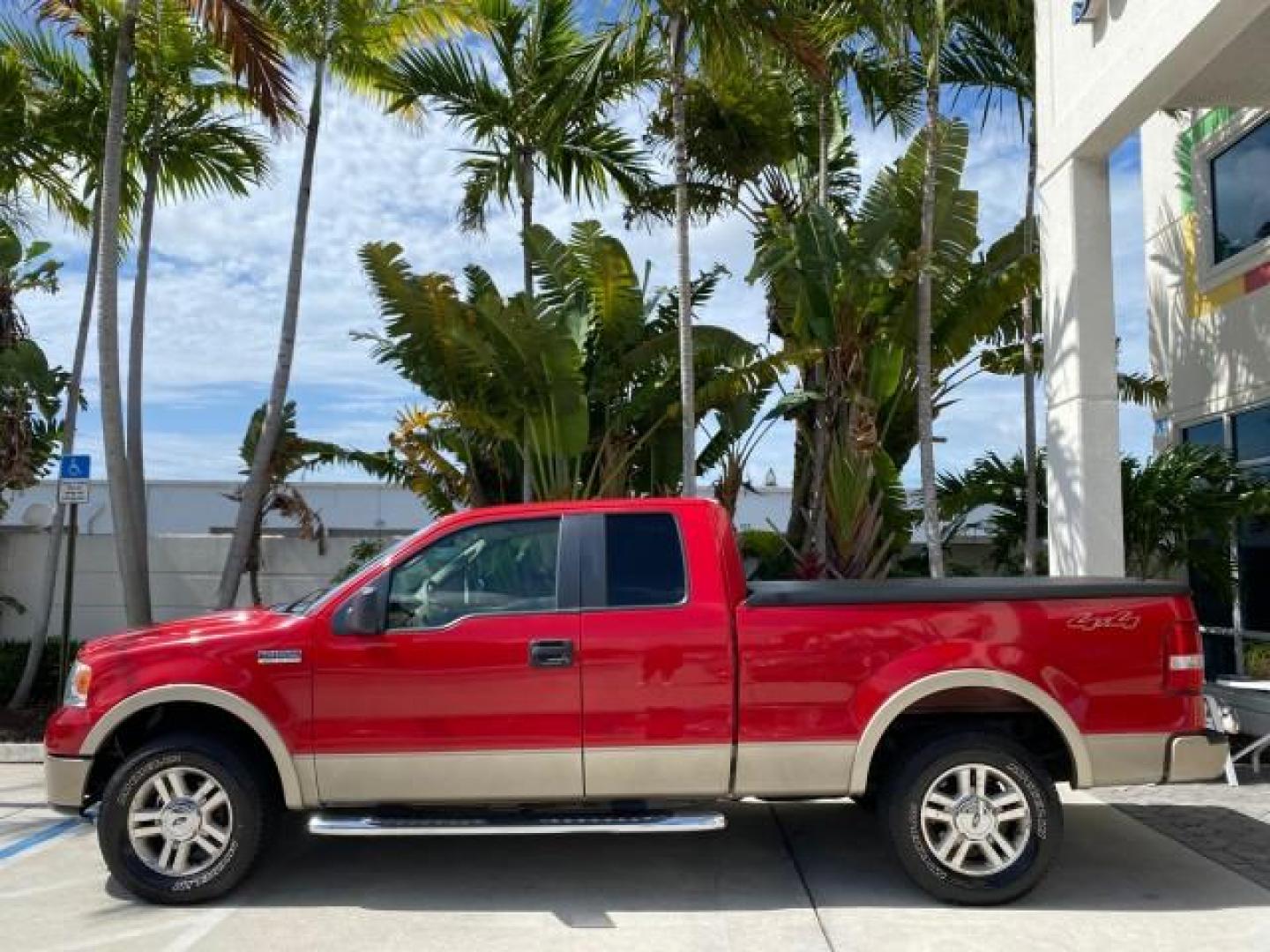 2007 Bright Red /Tan Ford F-150 Lariat 4WD LEATHER LOW MILES 80,286 (1FTPX14V97N) with an 5.4L 24-Valve EFI FFV V8 Engine engine, Automatic transmission, located at 4701 North Dixie Hwy, Pompano Beach, FL, 33064, (954) 422-2889, 26.240938, -80.123474 - OUR WEBPAGE FLORIDACARS1.COM HAS OVER 100 PHOTOS AND FREE CARFAX LINK 2007 Ford F-150 Lariat 4 Door Extended Cab Pickup 5.4L V8 F SOHC Flex Fuel 18 MPG Rear Wheel Drive w/ 4X4 Features 20 Inch Plus Wheels 4WD/AWD ABS Brakes Air Conditioning Alloy Wheels AM/FM Stereo Automatic Transmission Auxiliary- Photo#31