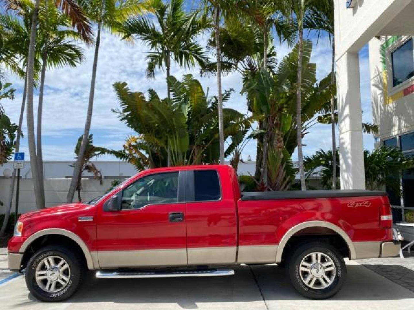 2007 Bright Red /Tan Ford F-150 Lariat 4WD LEATHER LOW MILES 80,286 (1FTPX14V97N) with an 5.4L 24-Valve EFI FFV V8 Engine engine, Automatic transmission, located at 4701 North Dixie Hwy, Pompano Beach, FL, 33064, (954) 422-2889, 26.240938, -80.123474 - OUR WEBPAGE FLORIDACARS1.COM HAS OVER 100 PHOTOS AND FREE CARFAX LINK 2007 Ford F-150 Lariat 4 Door Extended Cab Pickup 5.4L V8 F SOHC Flex Fuel 18 MPG Rear Wheel Drive w/ 4X4 Features 20 Inch Plus Wheels 4WD/AWD ABS Brakes Air Conditioning Alloy Wheels AM/FM Stereo Automatic Transmission Auxiliary- Photo#32