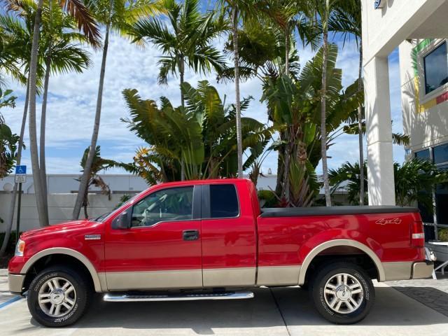 2007 Bright Red /Tan Ford F-150 Lariat 4WD LEATHER LOW MILES 80,286 (1FTPX14V97N) with an 5.4L 24-Valve EFI FFV V8 Engine engine, Automatic transmission, located at 4701 North Dixie Hwy, Pompano Beach, FL, 33064, (954) 422-2889, 26.240938, -80.123474 - OUR WEBPAGE FLORIDACARS1.COM HAS OVER 100 PHOTOS AND FREE CARFAX LINK 2007 Ford F-150 Lariat 4 Door Extended Cab Pickup 5.4L V8 F SOHC Flex Fuel 18 MPG Rear Wheel Drive w/ 4X4 Features 20 Inch Plus Wheels 4WD/AWD ABS Brakes Air Conditioning Alloy Wheels AM/FM Stereo Automatic Transmission Auxiliary - Photo#32