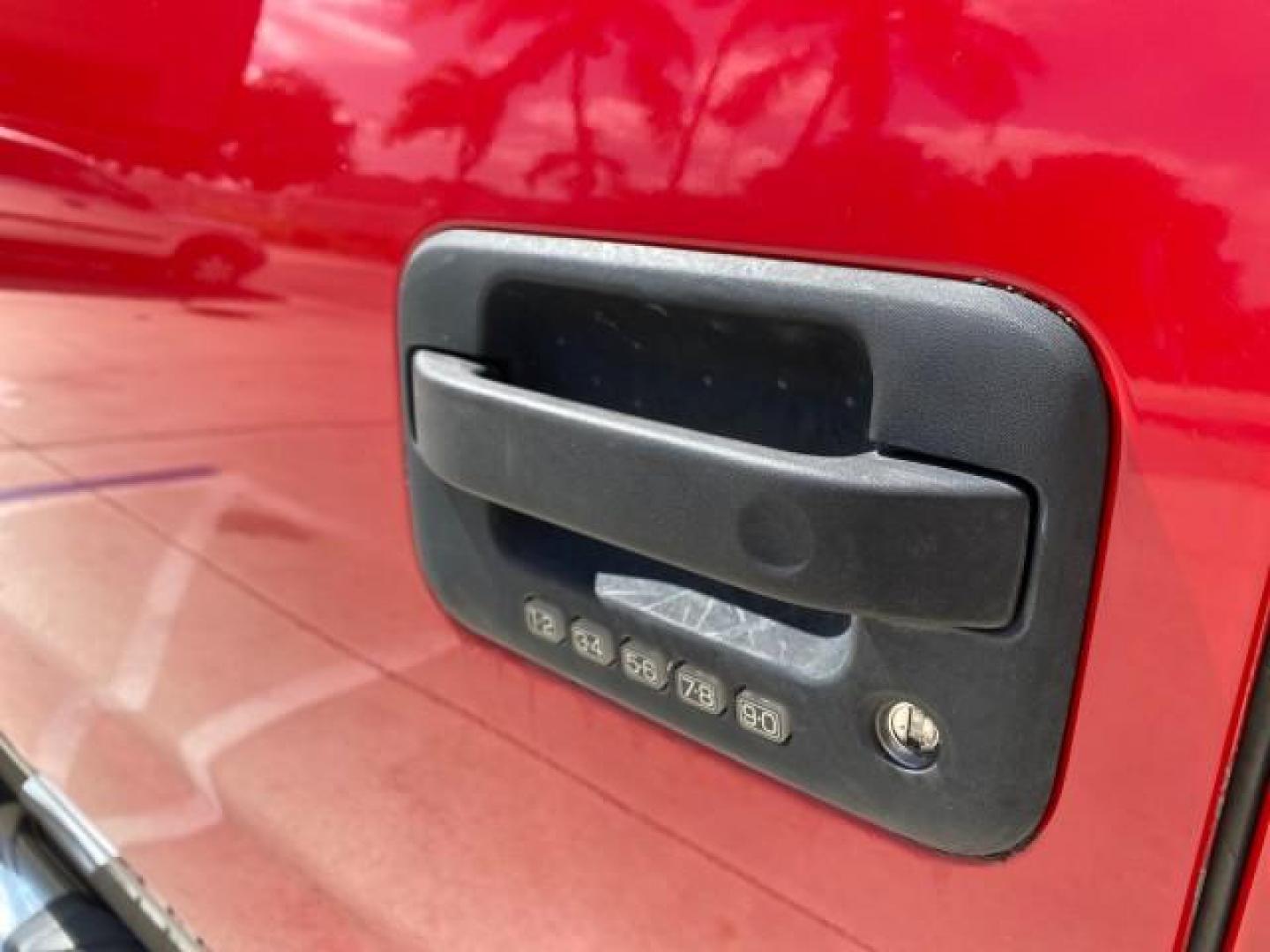 2007 Bright Red /Tan Ford F-150 Lariat 4WD LEATHER LOW MILES 80,286 (1FTPX14V97N) with an 5.4L 24-Valve EFI FFV V8 Engine engine, Automatic transmission, located at 4701 North Dixie Hwy, Pompano Beach, FL, 33064, (954) 422-2889, 26.240938, -80.123474 - OUR WEBPAGE FLORIDACARS1.COM HAS OVER 100 PHOTOS AND FREE CARFAX LINK 2007 Ford F-150 Lariat 4 Door Extended Cab Pickup 5.4L V8 F SOHC Flex Fuel 18 MPG Rear Wheel Drive w/ 4X4 Features 20 Inch Plus Wheels 4WD/AWD ABS Brakes Air Conditioning Alloy Wheels AM/FM Stereo Automatic Transmission Auxiliary- Photo#38