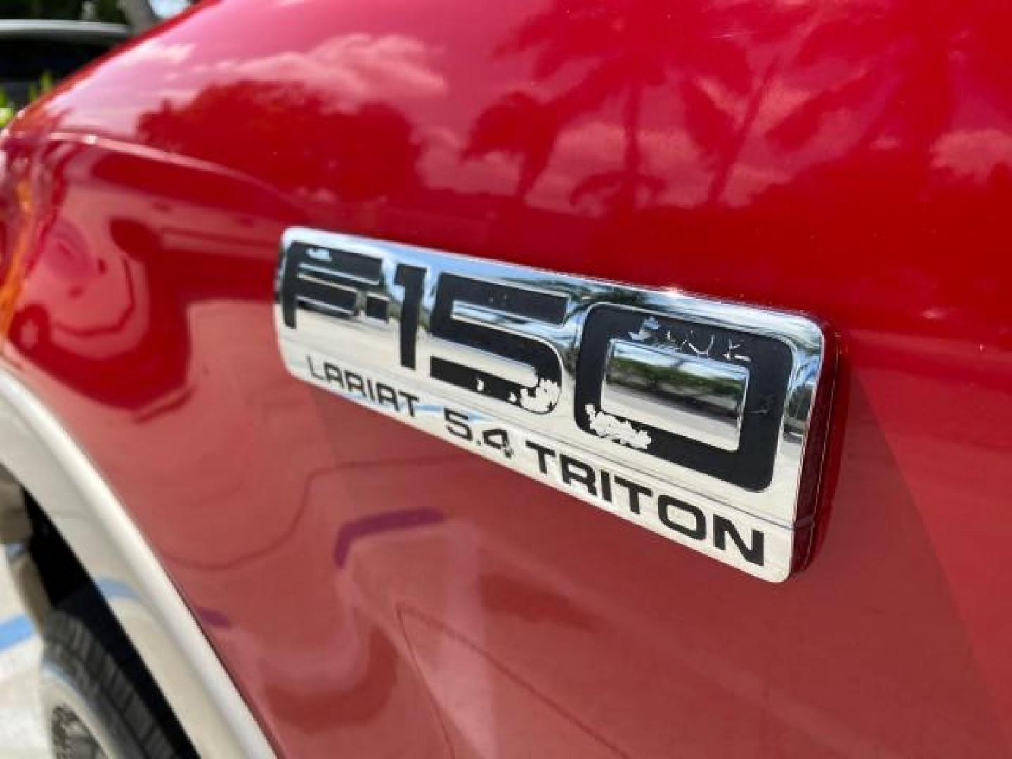 2007 Bright Red /Tan Ford F-150 Lariat 4WD LEATHER LOW MILES 80,286 (1FTPX14V97N) with an 5.4L 24-Valve EFI FFV V8 Engine engine, Automatic transmission, located at 4701 North Dixie Hwy, Pompano Beach, FL, 33064, (954) 422-2889, 26.240938, -80.123474 - OUR WEBPAGE FLORIDACARS1.COM HAS OVER 100 PHOTOS AND FREE CARFAX LINK 2007 Ford F-150 Lariat 4 Door Extended Cab Pickup 5.4L V8 F SOHC Flex Fuel 18 MPG Rear Wheel Drive w/ 4X4 Features 20 Inch Plus Wheels 4WD/AWD ABS Brakes Air Conditioning Alloy Wheels AM/FM Stereo Automatic Transmission Auxiliary- Photo#41