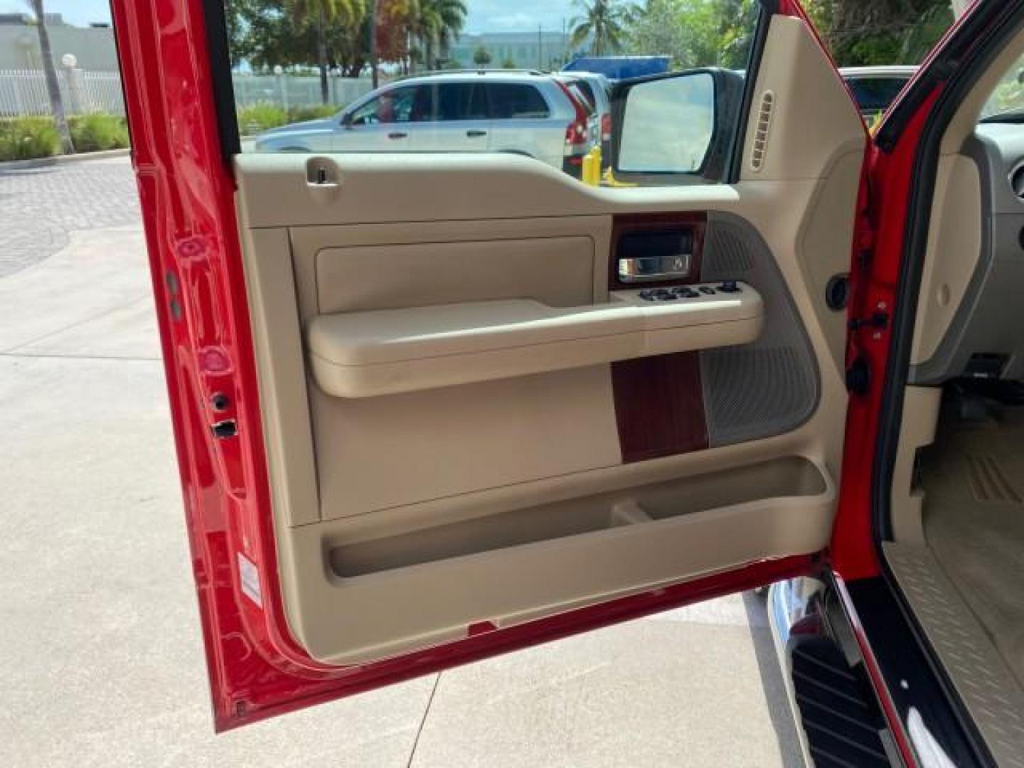 2007 Bright Red /Tan Ford F-150 Lariat 4WD LEATHER LOW MILES 80,286 (1FTPX14V97N) with an 5.4L 24-Valve EFI FFV V8 Engine engine, Automatic transmission, located at 4701 North Dixie Hwy, Pompano Beach, FL, 33064, (954) 422-2889, 26.240938, -80.123474 - OUR WEBPAGE FLORIDACARS1.COM HAS OVER 100 PHOTOS AND FREE CARFAX LINK 2007 Ford F-150 Lariat 4 Door Extended Cab Pickup 5.4L V8 F SOHC Flex Fuel 18 MPG Rear Wheel Drive w/ 4X4 Features 20 Inch Plus Wheels 4WD/AWD ABS Brakes Air Conditioning Alloy Wheels AM/FM Stereo Automatic Transmission Auxiliary- Photo#43