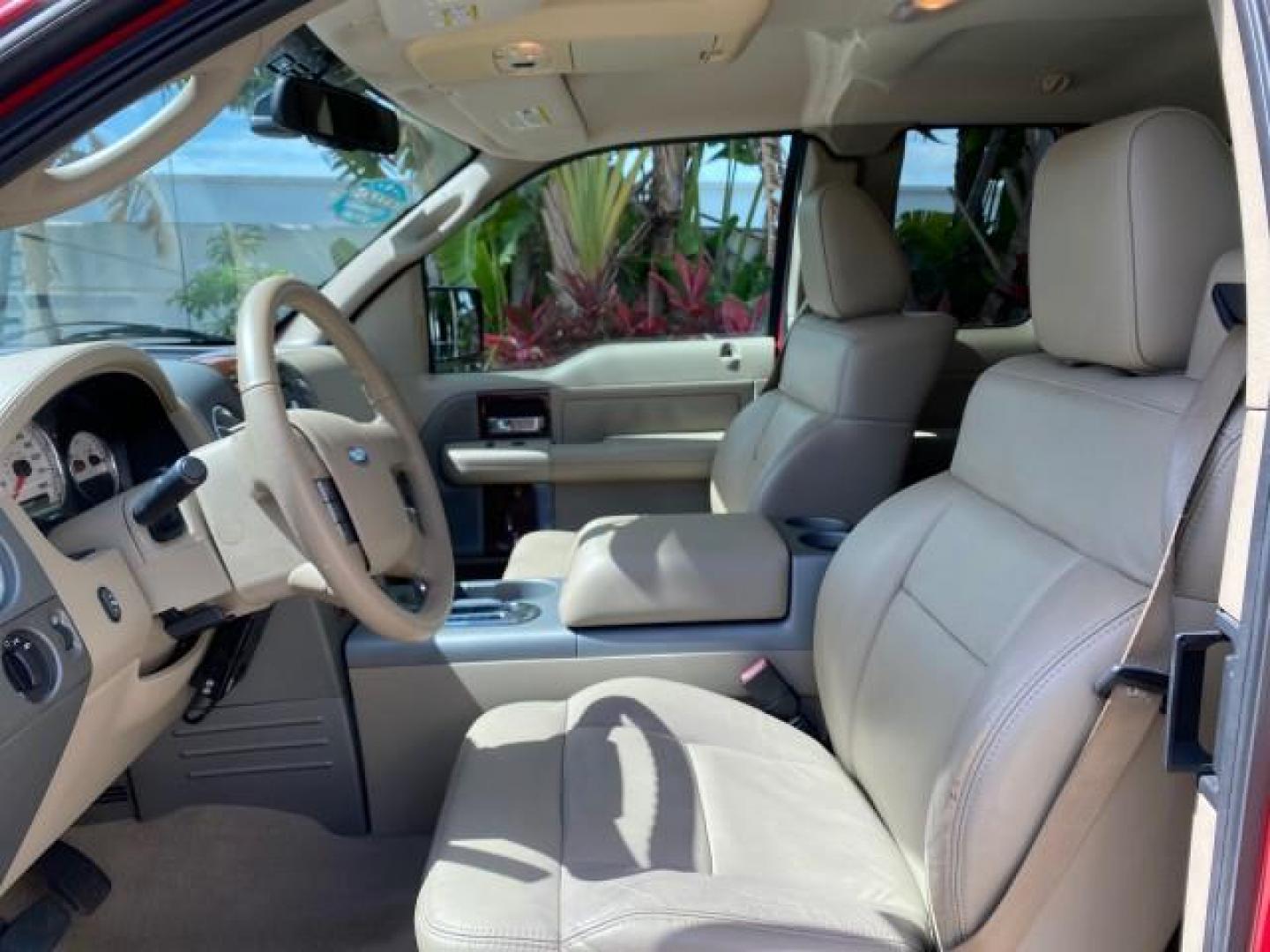 2007 Bright Red /Tan Ford F-150 Lariat 4WD LEATHER LOW MILES 80,286 (1FTPX14V97N) with an 5.4L 24-Valve EFI FFV V8 Engine engine, Automatic transmission, located at 4701 North Dixie Hwy, Pompano Beach, FL, 33064, (954) 422-2889, 26.240938, -80.123474 - OUR WEBPAGE FLORIDACARS1.COM HAS OVER 100 PHOTOS AND FREE CARFAX LINK 2007 Ford F-150 Lariat 4 Door Extended Cab Pickup 5.4L V8 F SOHC Flex Fuel 18 MPG Rear Wheel Drive w/ 4X4 Features 20 Inch Plus Wheels 4WD/AWD ABS Brakes Air Conditioning Alloy Wheels AM/FM Stereo Automatic Transmission Auxiliary- Photo#45