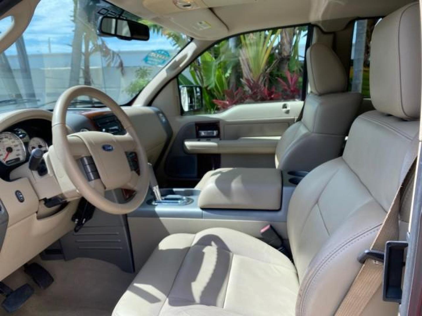 2007 Bright Red /Tan Ford F-150 Lariat 4WD LEATHER LOW MILES 80,286 (1FTPX14V97N) with an 5.4L 24-Valve EFI FFV V8 Engine engine, Automatic transmission, located at 4701 North Dixie Hwy, Pompano Beach, FL, 33064, (954) 422-2889, 26.240938, -80.123474 - OUR WEBPAGE FLORIDACARS1.COM HAS OVER 100 PHOTOS AND FREE CARFAX LINK 2007 Ford F-150 Lariat 4 Door Extended Cab Pickup 5.4L V8 F SOHC Flex Fuel 18 MPG Rear Wheel Drive w/ 4X4 Features 20 Inch Plus Wheels 4WD/AWD ABS Brakes Air Conditioning Alloy Wheels AM/FM Stereo Automatic Transmission Auxiliary- Photo#46