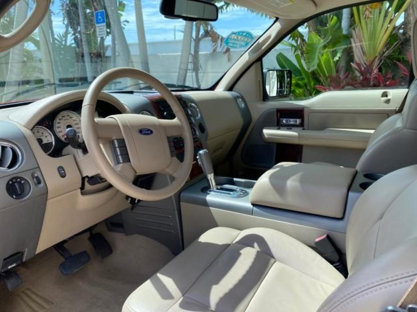 2007 Bright Red /Tan Ford F-150 Lariat 4WD LEATHER LOW MILES 80,286 (1FTPX14V97N) with an 5.4L 24-Valve EFI FFV V8 Engine engine, Automatic transmission, located at 4701 North Dixie Hwy, Pompano Beach, FL, 33064, (954) 422-2889, 26.240938, -80.123474 - OUR WEBPAGE FLORIDACARS1.COM HAS OVER 100 PHOTOS AND FREE CARFAX LINK 2007 Ford F-150 Lariat 4 Door Extended Cab Pickup 5.4L V8 F SOHC Flex Fuel 18 MPG Rear Wheel Drive w/ 4X4 Features 20 Inch Plus Wheels 4WD/AWD ABS Brakes Air Conditioning Alloy Wheels AM/FM Stereo Automatic Transmission Auxiliary- Photo#47
