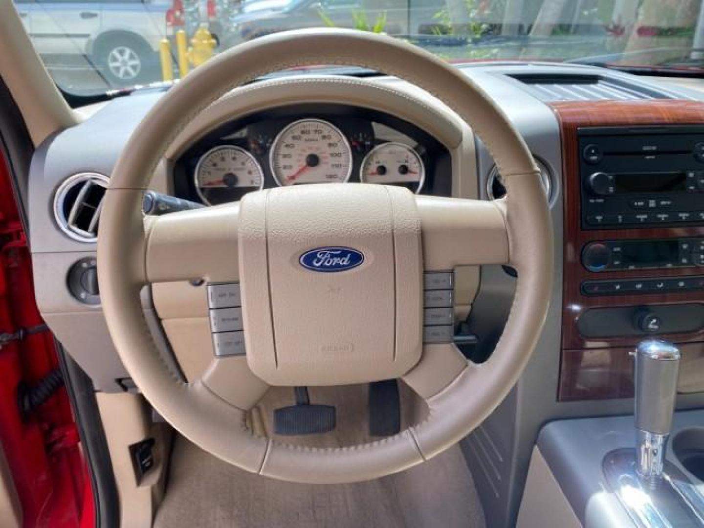 2007 Bright Red /Tan Ford F-150 Lariat 4WD LEATHER LOW MILES 80,286 (1FTPX14V97N) with an 5.4L 24-Valve EFI FFV V8 Engine engine, Automatic transmission, located at 4701 North Dixie Hwy, Pompano Beach, FL, 33064, (954) 422-2889, 26.240938, -80.123474 - OUR WEBPAGE FLORIDACARS1.COM HAS OVER 100 PHOTOS AND FREE CARFAX LINK 2007 Ford F-150 Lariat 4 Door Extended Cab Pickup 5.4L V8 F SOHC Flex Fuel 18 MPG Rear Wheel Drive w/ 4X4 Features 20 Inch Plus Wheels 4WD/AWD ABS Brakes Air Conditioning Alloy Wheels AM/FM Stereo Automatic Transmission Auxiliary- Photo#49