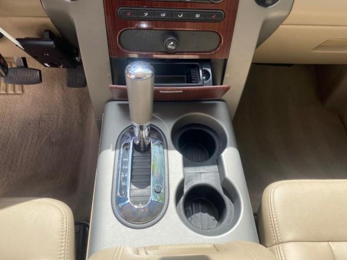 2007 Bright Red /Tan Ford F-150 Lariat 4WD LEATHER LOW MILES 80,286 (1FTPX14V97N) with an 5.4L 24-Valve EFI FFV V8 Engine engine, Automatic transmission, located at 4701 North Dixie Hwy, Pompano Beach, FL, 33064, (954) 422-2889, 26.240938, -80.123474 - OUR WEBPAGE FLORIDACARS1.COM HAS OVER 100 PHOTOS AND FREE CARFAX LINK 2007 Ford F-150 Lariat 4 Door Extended Cab Pickup 5.4L V8 F SOHC Flex Fuel 18 MPG Rear Wheel Drive w/ 4X4 Features 20 Inch Plus Wheels 4WD/AWD ABS Brakes Air Conditioning Alloy Wheels AM/FM Stereo Automatic Transmission Auxiliary- Photo#60
