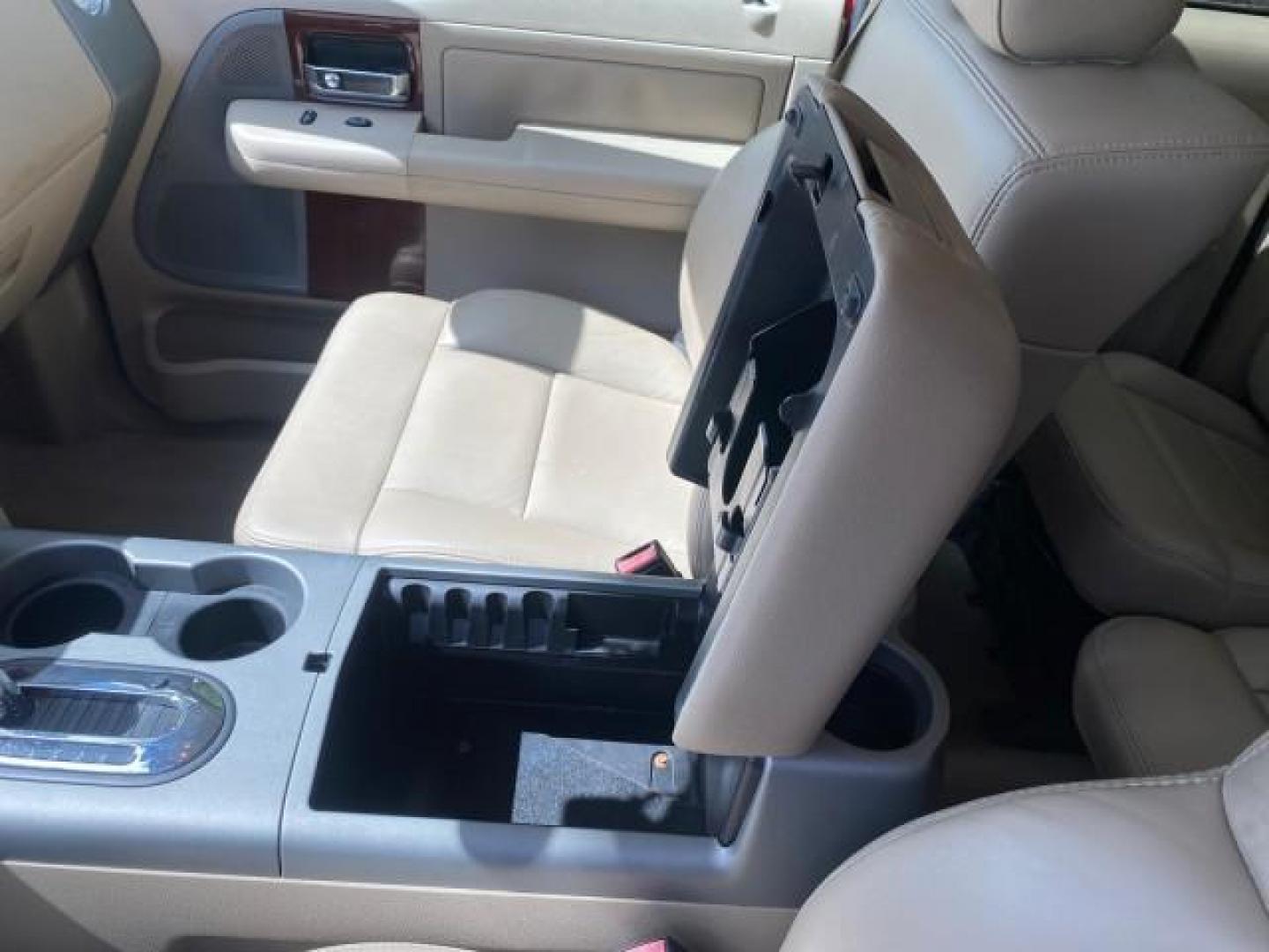 2007 Bright Red /Tan Ford F-150 Lariat 4WD LEATHER LOW MILES 80,286 (1FTPX14V97N) with an 5.4L 24-Valve EFI FFV V8 Engine engine, Automatic transmission, located at 4701 North Dixie Hwy, Pompano Beach, FL, 33064, (954) 422-2889, 26.240938, -80.123474 - OUR WEBPAGE FLORIDACARS1.COM HAS OVER 100 PHOTOS AND FREE CARFAX LINK 2007 Ford F-150 Lariat 4 Door Extended Cab Pickup 5.4L V8 F SOHC Flex Fuel 18 MPG Rear Wheel Drive w/ 4X4 Features 20 Inch Plus Wheels 4WD/AWD ABS Brakes Air Conditioning Alloy Wheels AM/FM Stereo Automatic Transmission Auxiliary- Photo#63