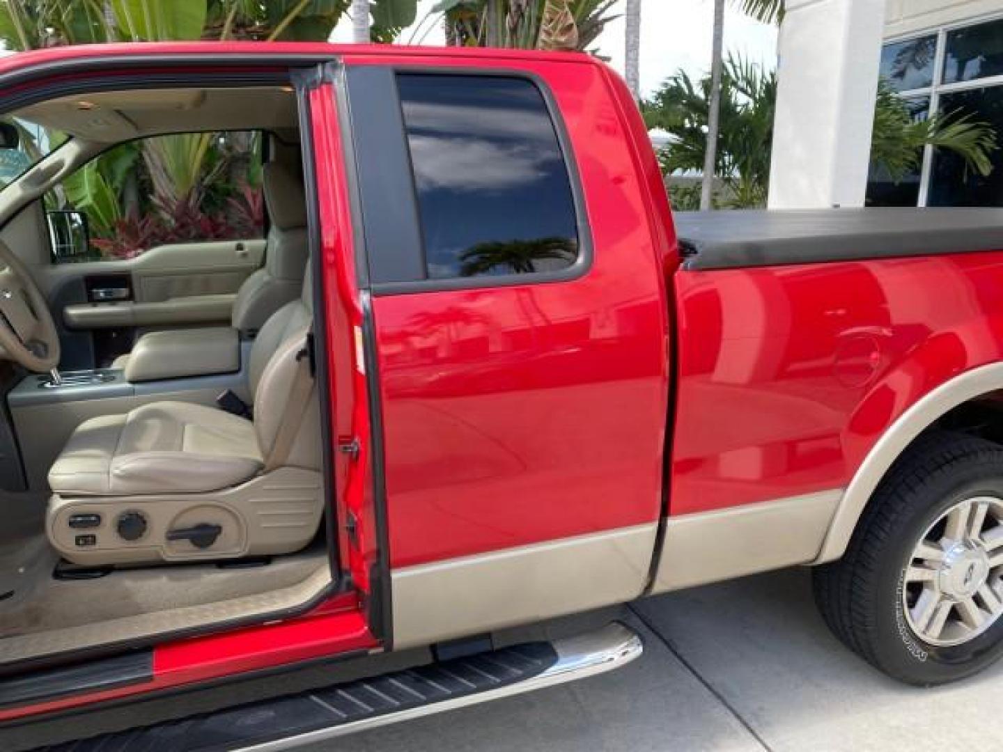 2007 Bright Red /Tan Ford F-150 Lariat 4WD LEATHER LOW MILES 80,286 (1FTPX14V97N) with an 5.4L 24-Valve EFI FFV V8 Engine engine, Automatic transmission, located at 4701 North Dixie Hwy, Pompano Beach, FL, 33064, (954) 422-2889, 26.240938, -80.123474 - OUR WEBPAGE FLORIDACARS1.COM HAS OVER 100 PHOTOS AND FREE CARFAX LINK 2007 Ford F-150 Lariat 4 Door Extended Cab Pickup 5.4L V8 F SOHC Flex Fuel 18 MPG Rear Wheel Drive w/ 4X4 Features 20 Inch Plus Wheels 4WD/AWD ABS Brakes Air Conditioning Alloy Wheels AM/FM Stereo Automatic Transmission Auxiliary- Photo#74