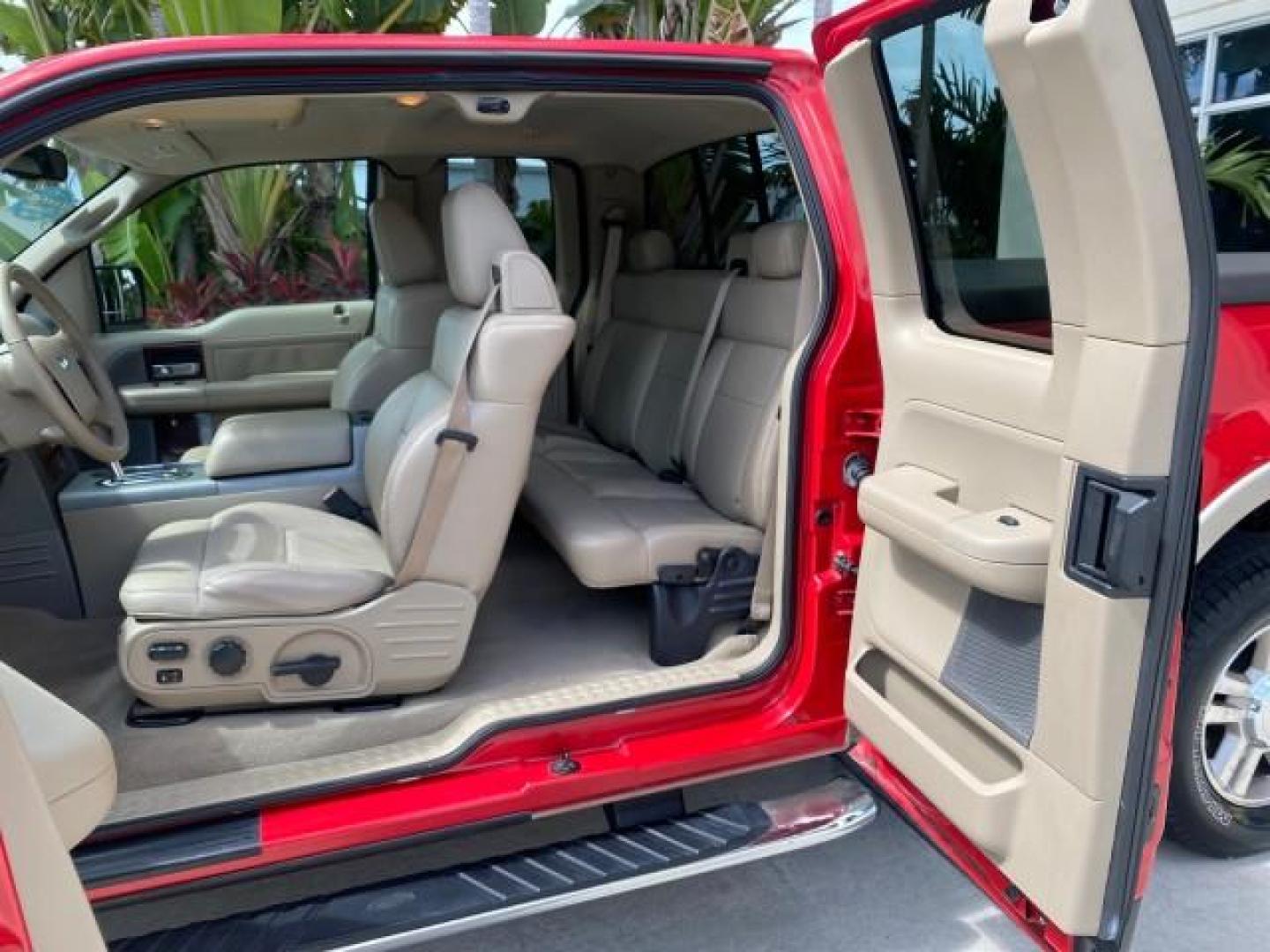 2007 Bright Red /Tan Ford F-150 Lariat 4WD LEATHER LOW MILES 80,286 (1FTPX14V97N) with an 5.4L 24-Valve EFI FFV V8 Engine engine, Automatic transmission, located at 4701 North Dixie Hwy, Pompano Beach, FL, 33064, (954) 422-2889, 26.240938, -80.123474 - OUR WEBPAGE FLORIDACARS1.COM HAS OVER 100 PHOTOS AND FREE CARFAX LINK 2007 Ford F-150 Lariat 4 Door Extended Cab Pickup 5.4L V8 F SOHC Flex Fuel 18 MPG Rear Wheel Drive w/ 4X4 Features 20 Inch Plus Wheels 4WD/AWD ABS Brakes Air Conditioning Alloy Wheels AM/FM Stereo Automatic Transmission Auxiliary- Photo#76