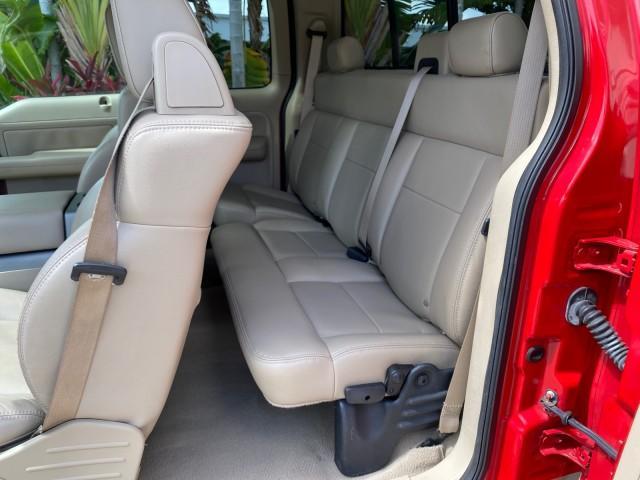 2007 Bright Red /Tan Ford F-150 Lariat 4WD LEATHER LOW MILES 80,286 (1FTPX14V97N) with an 5.4L 24-Valve EFI FFV V8 Engine engine, Automatic transmission, located at 4701 North Dixie Hwy, Pompano Beach, FL, 33064, (954) 422-2889, 26.240938, -80.123474 - OUR WEBPAGE FLORIDACARS1.COM HAS OVER 100 PHOTOS AND FREE CARFAX LINK 2007 Ford F-150 Lariat 4 Door Extended Cab Pickup 5.4L V8 F SOHC Flex Fuel 18 MPG Rear Wheel Drive w/ 4X4 Features 20 Inch Plus Wheels 4WD/AWD ABS Brakes Air Conditioning Alloy Wheels AM/FM Stereo Automatic Transmission Auxiliary - Photo#77