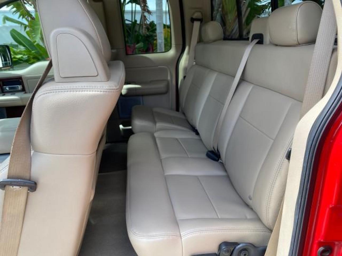 2007 Bright Red /Tan Ford F-150 Lariat 4WD LEATHER LOW MILES 80,286 (1FTPX14V97N) with an 5.4L 24-Valve EFI FFV V8 Engine engine, Automatic transmission, located at 4701 North Dixie Hwy, Pompano Beach, FL, 33064, (954) 422-2889, 26.240938, -80.123474 - OUR WEBPAGE FLORIDACARS1.COM HAS OVER 100 PHOTOS AND FREE CARFAX LINK 2007 Ford F-150 Lariat 4 Door Extended Cab Pickup 5.4L V8 F SOHC Flex Fuel 18 MPG Rear Wheel Drive w/ 4X4 Features 20 Inch Plus Wheels 4WD/AWD ABS Brakes Air Conditioning Alloy Wheels AM/FM Stereo Automatic Transmission Auxiliary- Photo#78
