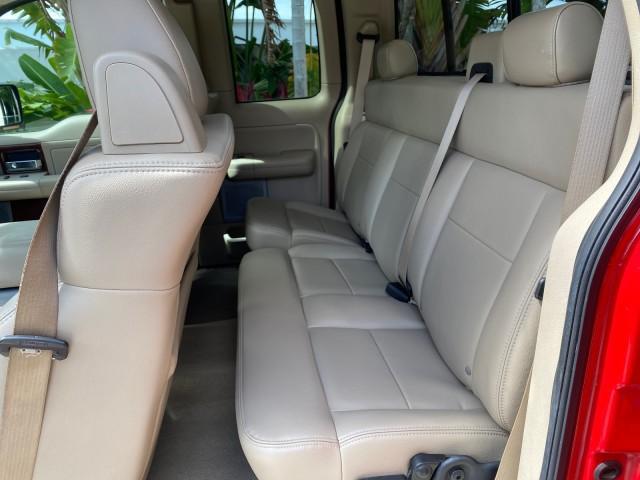 2007 Bright Red /Tan Ford F-150 Lariat 4WD LEATHER LOW MILES 80,286 (1FTPX14V97N) with an 5.4L 24-Valve EFI FFV V8 Engine engine, Automatic transmission, located at 4701 North Dixie Hwy, Pompano Beach, FL, 33064, (954) 422-2889, 26.240938, -80.123474 - OUR WEBPAGE FLORIDACARS1.COM HAS OVER 100 PHOTOS AND FREE CARFAX LINK 2007 Ford F-150 Lariat 4 Door Extended Cab Pickup 5.4L V8 F SOHC Flex Fuel 18 MPG Rear Wheel Drive w/ 4X4 Features 20 Inch Plus Wheels 4WD/AWD ABS Brakes Air Conditioning Alloy Wheels AM/FM Stereo Automatic Transmission Auxiliary - Photo#78