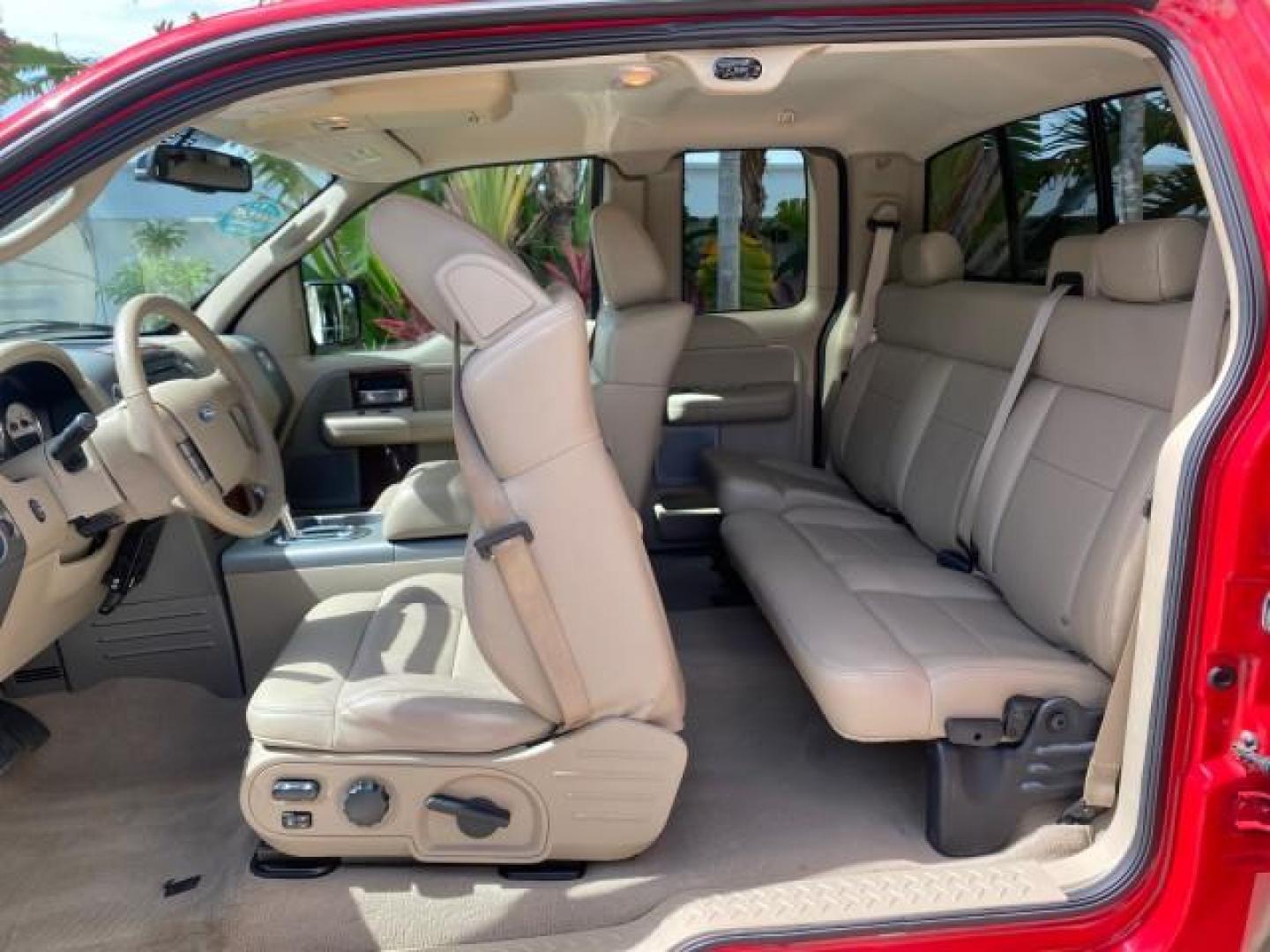 2007 Bright Red /Tan Ford F-150 Lariat 4WD LEATHER LOW MILES 80,286 (1FTPX14V97N) with an 5.4L 24-Valve EFI FFV V8 Engine engine, Automatic transmission, located at 4701 North Dixie Hwy, Pompano Beach, FL, 33064, (954) 422-2889, 26.240938, -80.123474 - OUR WEBPAGE FLORIDACARS1.COM HAS OVER 100 PHOTOS AND FREE CARFAX LINK 2007 Ford F-150 Lariat 4 Door Extended Cab Pickup 5.4L V8 F SOHC Flex Fuel 18 MPG Rear Wheel Drive w/ 4X4 Features 20 Inch Plus Wheels 4WD/AWD ABS Brakes Air Conditioning Alloy Wheels AM/FM Stereo Automatic Transmission Auxiliary- Photo#79