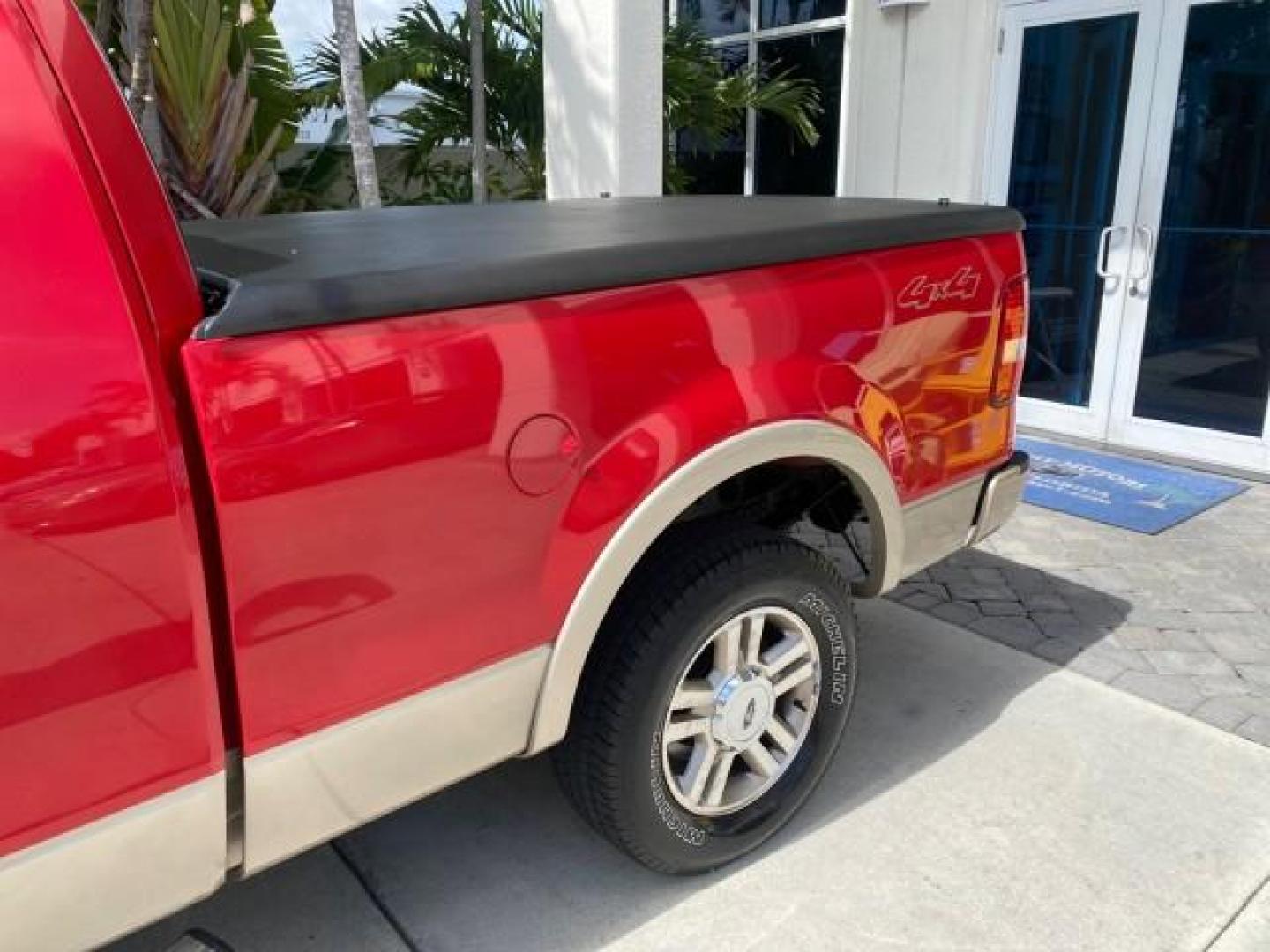 2007 Bright Red /Tan Ford F-150 Lariat 4WD LEATHER LOW MILES 80,286 (1FTPX14V97N) with an 5.4L 24-Valve EFI FFV V8 Engine engine, Automatic transmission, located at 4701 North Dixie Hwy, Pompano Beach, FL, 33064, (954) 422-2889, 26.240938, -80.123474 - OUR WEBPAGE FLORIDACARS1.COM HAS OVER 100 PHOTOS AND FREE CARFAX LINK 2007 Ford F-150 Lariat 4 Door Extended Cab Pickup 5.4L V8 F SOHC Flex Fuel 18 MPG Rear Wheel Drive w/ 4X4 Features 20 Inch Plus Wheels 4WD/AWD ABS Brakes Air Conditioning Alloy Wheels AM/FM Stereo Automatic Transmission Auxiliary- Photo#80