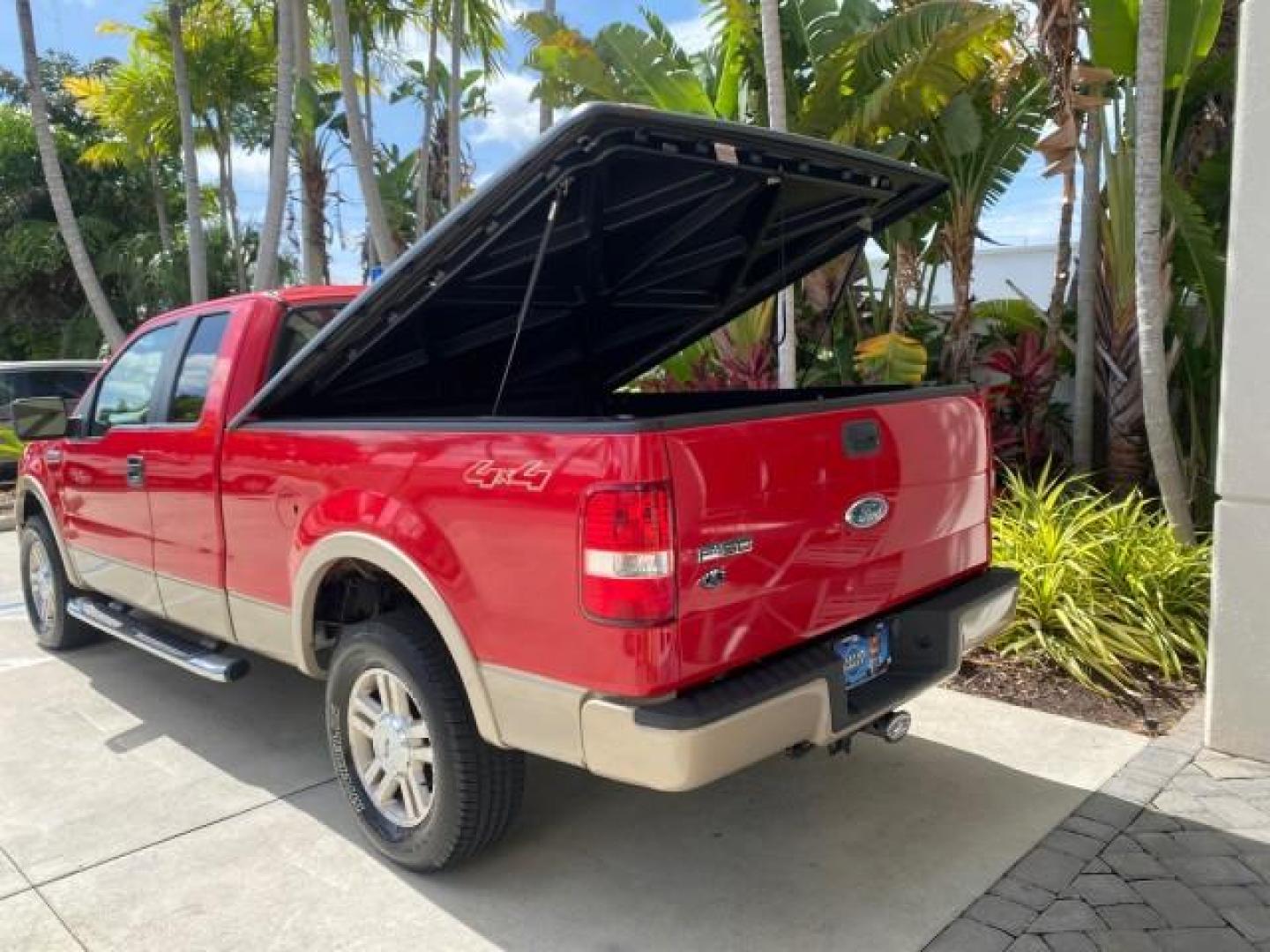2007 Bright Red /Tan Ford F-150 Lariat 4WD LEATHER LOW MILES 80,286 (1FTPX14V97N) with an 5.4L 24-Valve EFI FFV V8 Engine engine, Automatic transmission, located at 4701 North Dixie Hwy, Pompano Beach, FL, 33064, (954) 422-2889, 26.240938, -80.123474 - OUR WEBPAGE FLORIDACARS1.COM HAS OVER 100 PHOTOS AND FREE CARFAX LINK 2007 Ford F-150 Lariat 4 Door Extended Cab Pickup 5.4L V8 F SOHC Flex Fuel 18 MPG Rear Wheel Drive w/ 4X4 Features 20 Inch Plus Wheels 4WD/AWD ABS Brakes Air Conditioning Alloy Wheels AM/FM Stereo Automatic Transmission Auxiliary- Photo#91