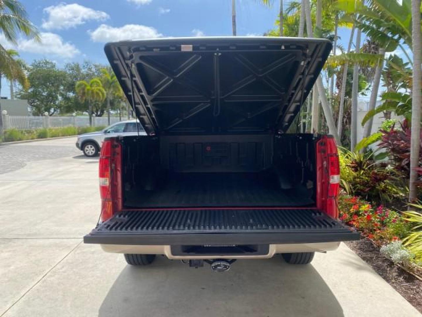 2007 Bright Red /Tan Ford F-150 Lariat 4WD LEATHER LOW MILES 80,286 (1FTPX14V97N) with an 5.4L 24-Valve EFI FFV V8 Engine engine, Automatic transmission, located at 4701 North Dixie Hwy, Pompano Beach, FL, 33064, (954) 422-2889, 26.240938, -80.123474 - OUR WEBPAGE FLORIDACARS1.COM HAS OVER 100 PHOTOS AND FREE CARFAX LINK 2007 Ford F-150 Lariat 4 Door Extended Cab Pickup 5.4L V8 F SOHC Flex Fuel 18 MPG Rear Wheel Drive w/ 4X4 Features 20 Inch Plus Wheels 4WD/AWD ABS Brakes Air Conditioning Alloy Wheels AM/FM Stereo Automatic Transmission Auxiliary- Photo#98