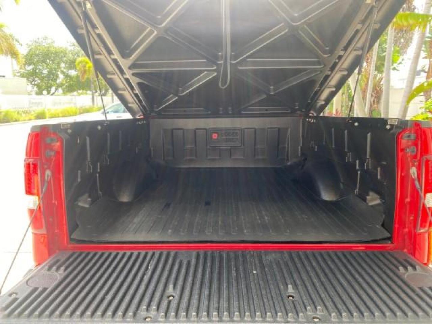 2007 Bright Red /Tan Ford F-150 Lariat 4WD LEATHER LOW MILES 80,286 (1FTPX14V97N) with an 5.4L 24-Valve EFI FFV V8 Engine engine, Automatic transmission, located at 4701 North Dixie Hwy, Pompano Beach, FL, 33064, (954) 422-2889, 26.240938, -80.123474 - OUR WEBPAGE FLORIDACARS1.COM HAS OVER 100 PHOTOS AND FREE CARFAX LINK 2007 Ford F-150 Lariat 4 Door Extended Cab Pickup 5.4L V8 F SOHC Flex Fuel 18 MPG Rear Wheel Drive w/ 4X4 Features 20 Inch Plus Wheels 4WD/AWD ABS Brakes Air Conditioning Alloy Wheels AM/FM Stereo Automatic Transmission Auxiliary- Photo#99