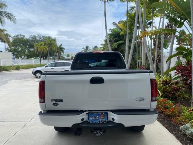 2003 Oxford White /Medium Graphite Ford F-150 XLT SPORT LOW MILES 70,700 1 OWNER (2FTRX17L63C) with an 5.4L 8-Cyl Engine engine, Automatic transmission, located at 4701 North Dixie Hwy, Pompano Beach, FL, 33064, (954) 422-2889, 26.240938, -80.123474 - OUR WEBPAGE FLORIDACARS1.COM HAS OVER 100 PHOTOS AND FREE CARFAX LINK 2003 Ford F-150 XLT 4 Door Extended Cab Pickup 5.4L V8 F SOHC 16V Gasoline 20 MPG Rear Wheel Drive Features ABS Brakes Air Conditioning Alloy Wheels AM/FM Stereo Automatic Transmission Auxiliary Audio Input Bluetooth Technology CD - Photo#6