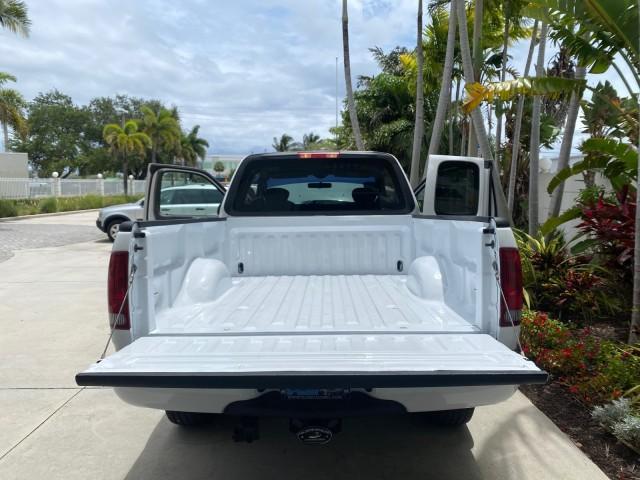 2003 Oxford White /Medium Graphite Ford F-150 XLT SPORT LOW MILES 70,700 1 OWNER (2FTRX17L63C) with an 5.4L 8-Cyl Engine engine, Automatic transmission, located at 4701 North Dixie Hwy, Pompano Beach, FL, 33064, (954) 422-2889, 26.240938, -80.123474 - OUR WEBPAGE FLORIDACARS1.COM HAS OVER 100 PHOTOS AND FREE CARFAX LINK 2003 Ford F-150 XLT 4 Door Extended Cab Pickup 5.4L V8 F SOHC 16V Gasoline 20 MPG Rear Wheel Drive Features ABS Brakes Air Conditioning Alloy Wheels AM/FM Stereo Automatic Transmission Auxiliary Audio Input Bluetooth Technology CD - Photo#15