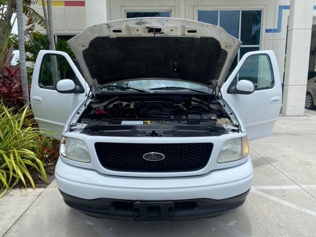 2003 Oxford White /Medium Graphite Ford F-150 XLT SPORT LOW MILES 70,700 1 OWNER (2FTRX17L63C) with an 5.4L 8-Cyl Engine engine, Automatic transmission, located at 4701 North Dixie Hwy, Pompano Beach, FL, 33064, (954) 422-2889, 26.240938, -80.123474 - OUR WEBPAGE FLORIDACARS1.COM HAS OVER 100 PHOTOS AND FREE CARFAX LINK 2003 Ford F-150 XLT 4 Door Extended Cab Pickup 5.4L V8 F SOHC 16V Gasoline 20 MPG Rear Wheel Drive Features ABS Brakes Air Conditioning Alloy Wheels AM/FM Stereo Automatic Transmission Auxiliary Audio Input Bluetooth Technology CD - Photo#17