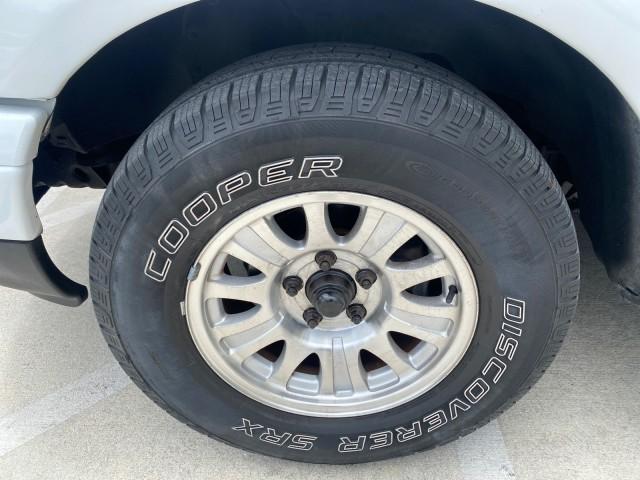 2003 Oxford White /Medium Graphite Ford F-150 XLT SPORT LOW MILES 70,700 1 OWNER (2FTRX17L63C) with an 5.4L 8-Cyl Engine engine, Automatic transmission, located at 4701 North Dixie Hwy, Pompano Beach, FL, 33064, (954) 422-2889, 26.240938, -80.123474 - OUR WEBPAGE FLORIDACARS1.COM HAS OVER 100 PHOTOS AND FREE CARFAX LINK 2003 Ford F-150 XLT 4 Door Extended Cab Pickup 5.4L V8 F SOHC 16V Gasoline 20 MPG Rear Wheel Drive Features ABS Brakes Air Conditioning Alloy Wheels AM/FM Stereo Automatic Transmission Auxiliary Audio Input Bluetooth Technology CD - Photo#19