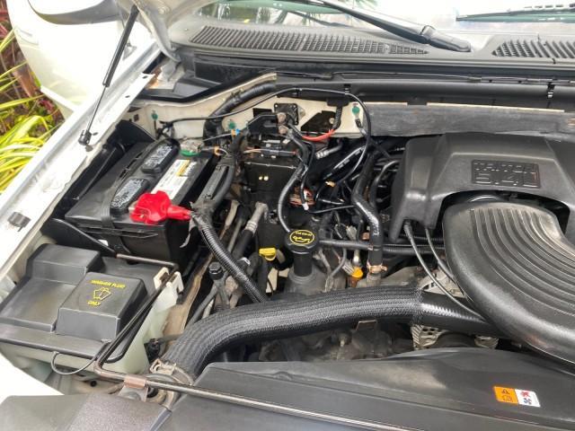 2003 Oxford White /Medium Graphite Ford F-150 XLT SPORT LOW MILES 70,700 1 OWNER (2FTRX17L63C) with an 5.4L 8-Cyl Engine engine, Automatic transmission, located at 4701 North Dixie Hwy, Pompano Beach, FL, 33064, (954) 422-2889, 26.240938, -80.123474 - OUR WEBPAGE FLORIDACARS1.COM HAS OVER 100 PHOTOS AND FREE CARFAX LINK 2003 Ford F-150 XLT 4 Door Extended Cab Pickup 5.4L V8 F SOHC 16V Gasoline 20 MPG Rear Wheel Drive Features ABS Brakes Air Conditioning Alloy Wheels AM/FM Stereo Automatic Transmission Auxiliary Audio Input Bluetooth Technology CD - Photo#24