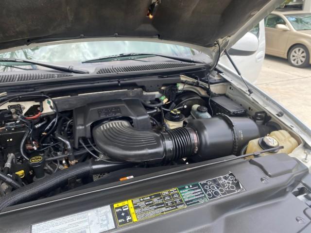 2003 Oxford White /Medium Graphite Ford F-150 XLT SPORT LOW MILES 70,700 1 OWNER (2FTRX17L63C) with an 5.4L 8-Cyl Engine engine, Automatic transmission, located at 4701 North Dixie Hwy, Pompano Beach, FL, 33064, (954) 422-2889, 26.240938, -80.123474 - OUR WEBPAGE FLORIDACARS1.COM HAS OVER 100 PHOTOS AND FREE CARFAX LINK 2003 Ford F-150 XLT 4 Door Extended Cab Pickup 5.4L V8 F SOHC 16V Gasoline 20 MPG Rear Wheel Drive Features ABS Brakes Air Conditioning Alloy Wheels AM/FM Stereo Automatic Transmission Auxiliary Audio Input Bluetooth Technology CD - Photo#25