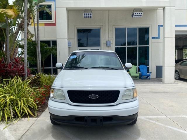 2003 Oxford White /Medium Graphite Ford F-150 XLT SPORT LOW MILES 70,700 1 OWNER (2FTRX17L63C) with an 5.4L 8-Cyl Engine engine, Automatic transmission, located at 4701 North Dixie Hwy, Pompano Beach, FL, 33064, (954) 422-2889, 26.240938, -80.123474 - OUR WEBPAGE FLORIDACARS1.COM HAS OVER 100 PHOTOS AND FREE CARFAX LINK 2003 Ford F-150 XLT 4 Door Extended Cab Pickup 5.4L V8 F SOHC 16V Gasoline 20 MPG Rear Wheel Drive Features ABS Brakes Air Conditioning Alloy Wheels AM/FM Stereo Automatic Transmission Auxiliary Audio Input Bluetooth Technology CD - Photo#26