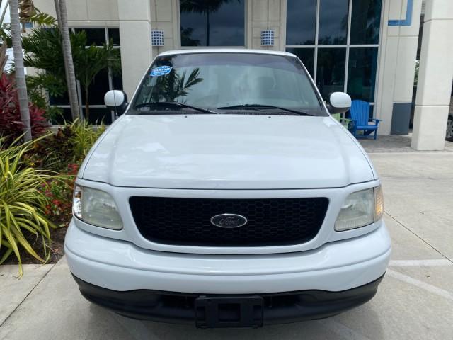 2003 Oxford White /Medium Graphite Ford F-150 XLT SPORT LOW MILES 70,700 1 OWNER (2FTRX17L63C) with an 5.4L 8-Cyl Engine engine, Automatic transmission, located at 4701 North Dixie Hwy, Pompano Beach, FL, 33064, (954) 422-2889, 26.240938, -80.123474 - OUR WEBPAGE FLORIDACARS1.COM HAS OVER 100 PHOTOS AND FREE CARFAX LINK 2003 Ford F-150 XLT 4 Door Extended Cab Pickup 5.4L V8 F SOHC 16V Gasoline 20 MPG Rear Wheel Drive Features ABS Brakes Air Conditioning Alloy Wheels AM/FM Stereo Automatic Transmission Auxiliary Audio Input Bluetooth Technology CD - Photo#27