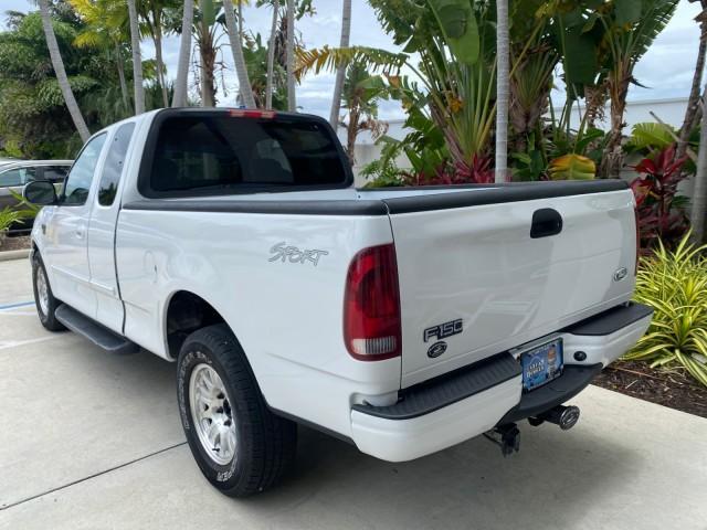 2003 Oxford White /Medium Graphite Ford F-150 XLT SPORT LOW MILES 70,700 1 OWNER (2FTRX17L63C) with an 5.4L 8-Cyl Engine engine, Automatic transmission, located at 4701 North Dixie Hwy, Pompano Beach, FL, 33064, (954) 422-2889, 26.240938, -80.123474 - OUR WEBPAGE FLORIDACARS1.COM HAS OVER 100 PHOTOS AND FREE CARFAX LINK 2003 Ford F-150 XLT 4 Door Extended Cab Pickup 5.4L V8 F SOHC 16V Gasoline 20 MPG Rear Wheel Drive Features ABS Brakes Air Conditioning Alloy Wheels AM/FM Stereo Automatic Transmission Auxiliary Audio Input Bluetooth Technology CD - Photo#33