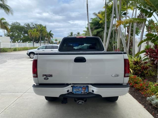 2003 Oxford White /Medium Graphite Ford F-150 XLT SPORT LOW MILES 70,700 1 OWNER (2FTRX17L63C) with an 5.4L 8-Cyl Engine engine, Automatic transmission, located at 4701 North Dixie Hwy, Pompano Beach, FL, 33064, (954) 422-2889, 26.240938, -80.123474 - OUR WEBPAGE FLORIDACARS1.COM HAS OVER 100 PHOTOS AND FREE CARFAX LINK 2003 Ford F-150 XLT 4 Door Extended Cab Pickup 5.4L V8 F SOHC 16V Gasoline 20 MPG Rear Wheel Drive Features ABS Brakes Air Conditioning Alloy Wheels AM/FM Stereo Automatic Transmission Auxiliary Audio Input Bluetooth Technology CD - Photo#34