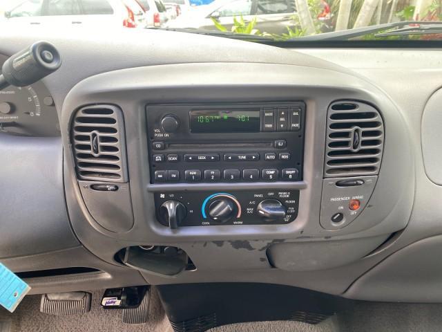 2003 Oxford White /Medium Graphite Ford F-150 XLT SPORT LOW MILES 70,700 1 OWNER (2FTRX17L63C) with an 5.4L 8-Cyl Engine engine, Automatic transmission, located at 4701 North Dixie Hwy, Pompano Beach, FL, 33064, (954) 422-2889, 26.240938, -80.123474 - OUR WEBPAGE FLORIDACARS1.COM HAS OVER 100 PHOTOS AND FREE CARFAX LINK 2003 Ford F-150 XLT 4 Door Extended Cab Pickup 5.4L V8 F SOHC 16V Gasoline 20 MPG Rear Wheel Drive Features ABS Brakes Air Conditioning Alloy Wheels AM/FM Stereo Automatic Transmission Auxiliary Audio Input Bluetooth Technology CD - Photo#60
