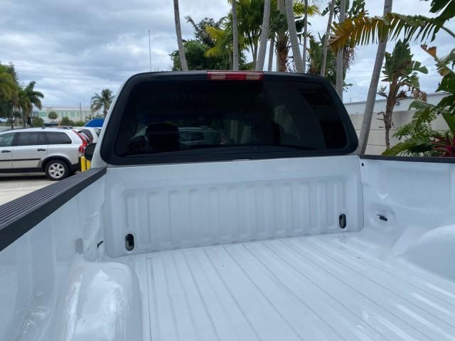 2003 Oxford White /Medium Graphite Ford F-150 XLT SPORT LOW MILES 70,700 1 OWNER (2FTRX17L63C) with an 5.4L 8-Cyl Engine engine, Automatic transmission, located at 4701 North Dixie Hwy, Pompano Beach, FL, 33064, (954) 422-2889, 26.240938, -80.123474 - OUR WEBPAGE FLORIDACARS1.COM HAS OVER 100 PHOTOS AND FREE CARFAX LINK 2003 Ford F-150 XLT 4 Door Extended Cab Pickup 5.4L V8 F SOHC 16V Gasoline 20 MPG Rear Wheel Drive Features ABS Brakes Air Conditioning Alloy Wheels AM/FM Stereo Automatic Transmission Auxiliary Audio Input Bluetooth Technology CD - Photo#87